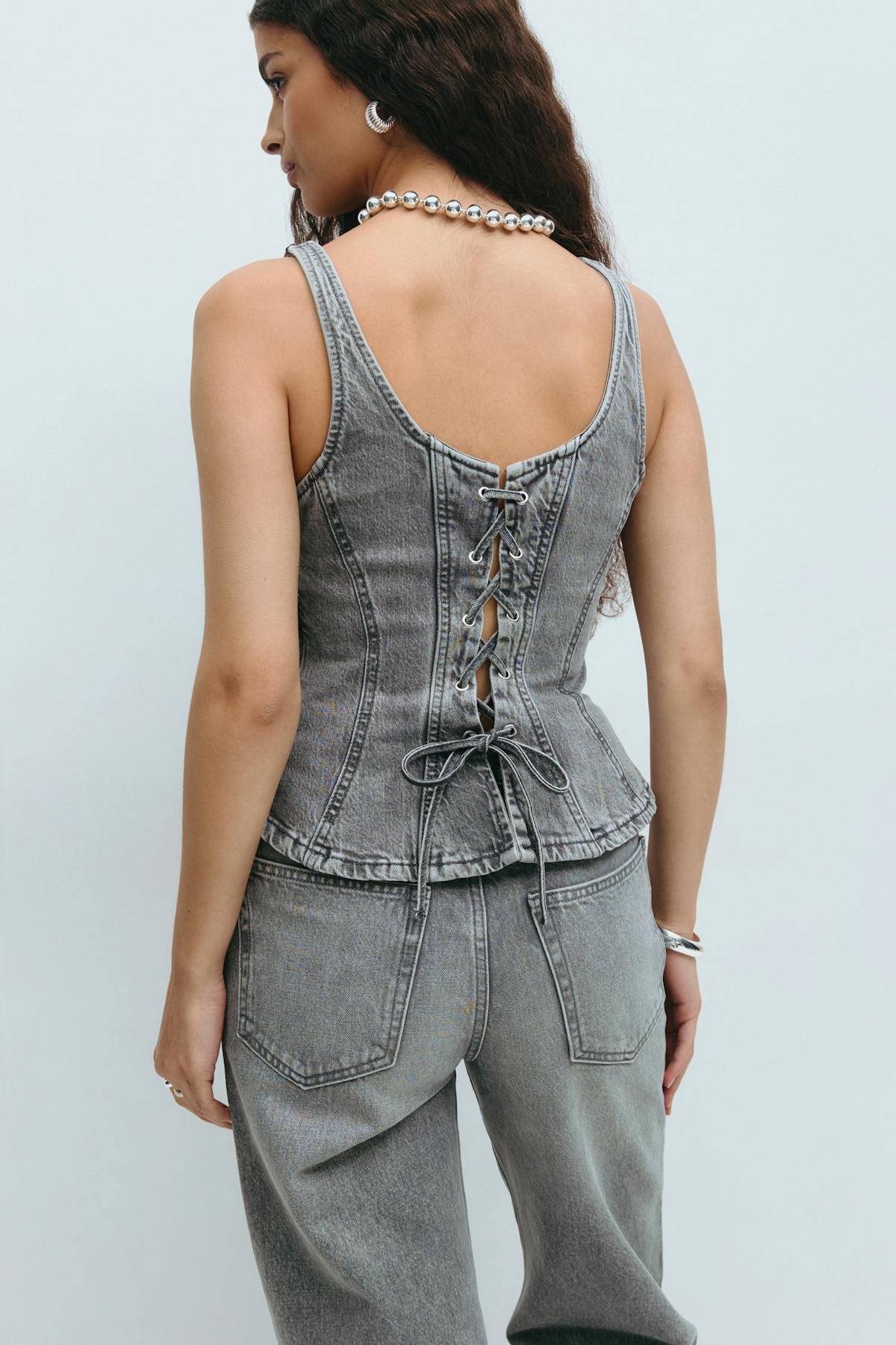 Lacing peplum denim top