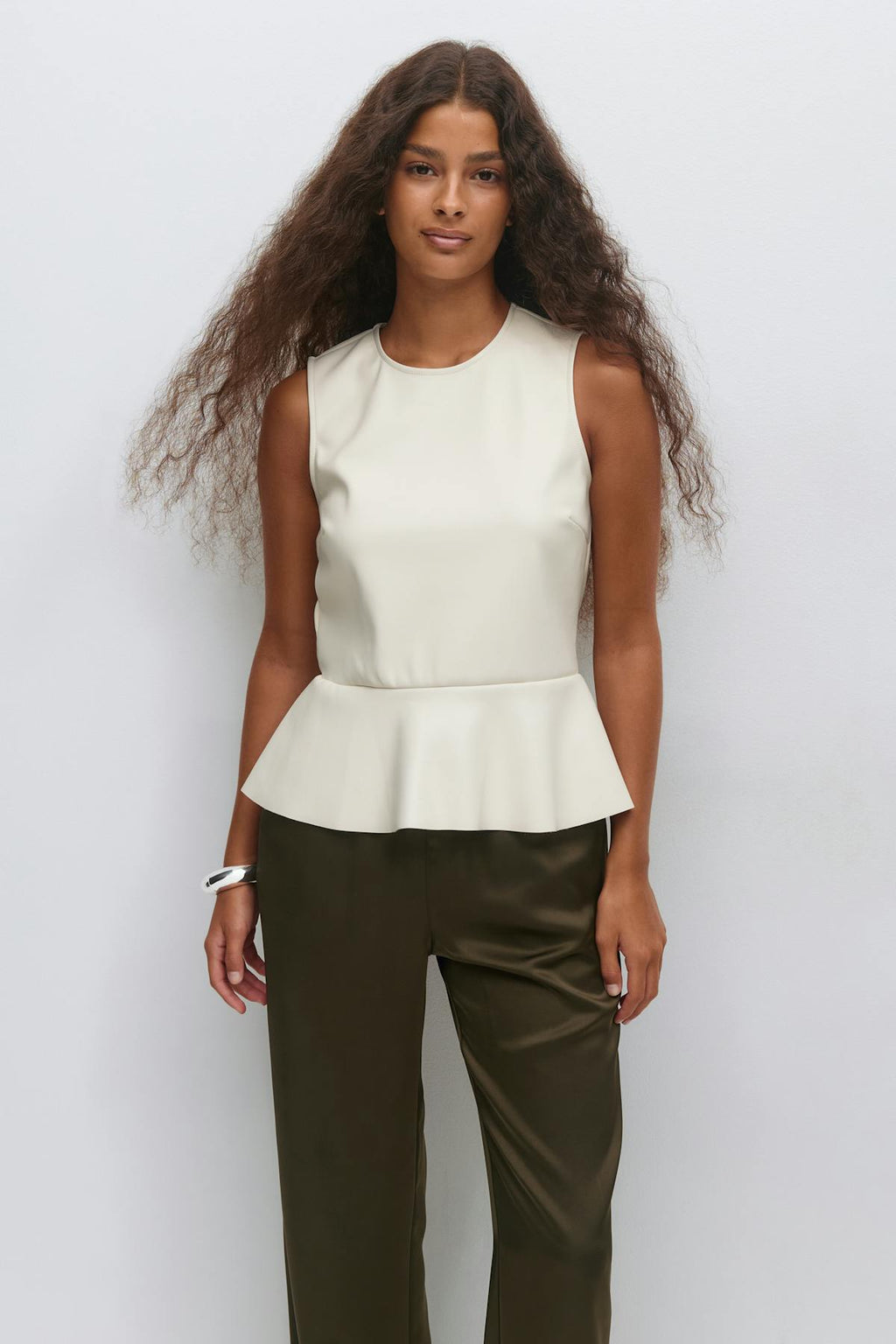 Pu peplum top