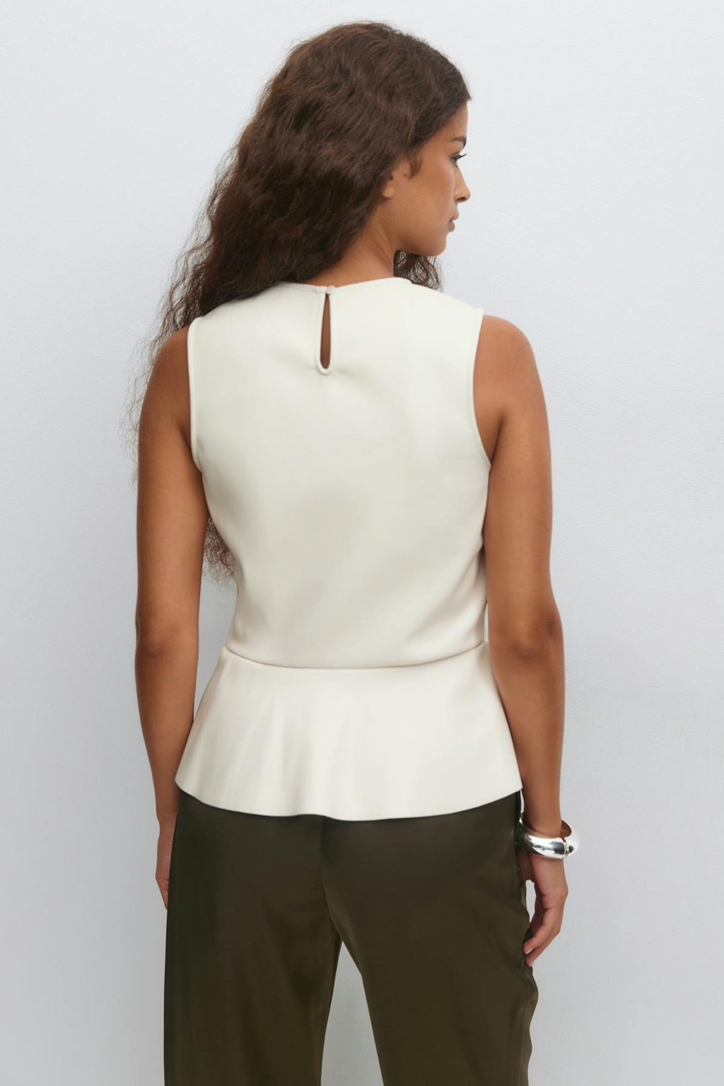 Pu peplum top