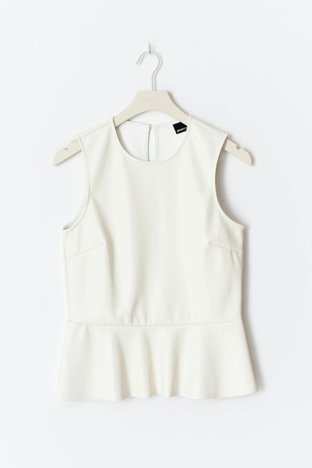 Pu peplum top