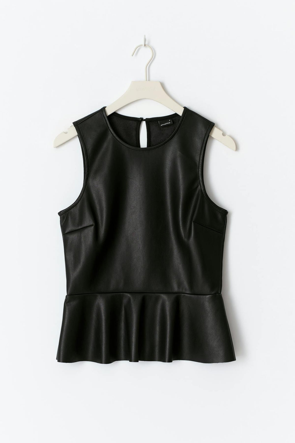 Pu peplum top