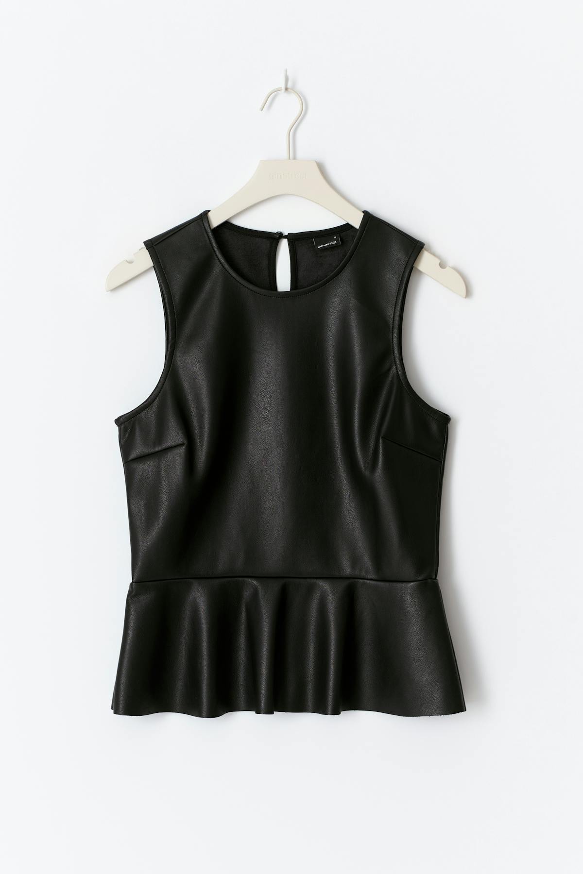Pu peplum top