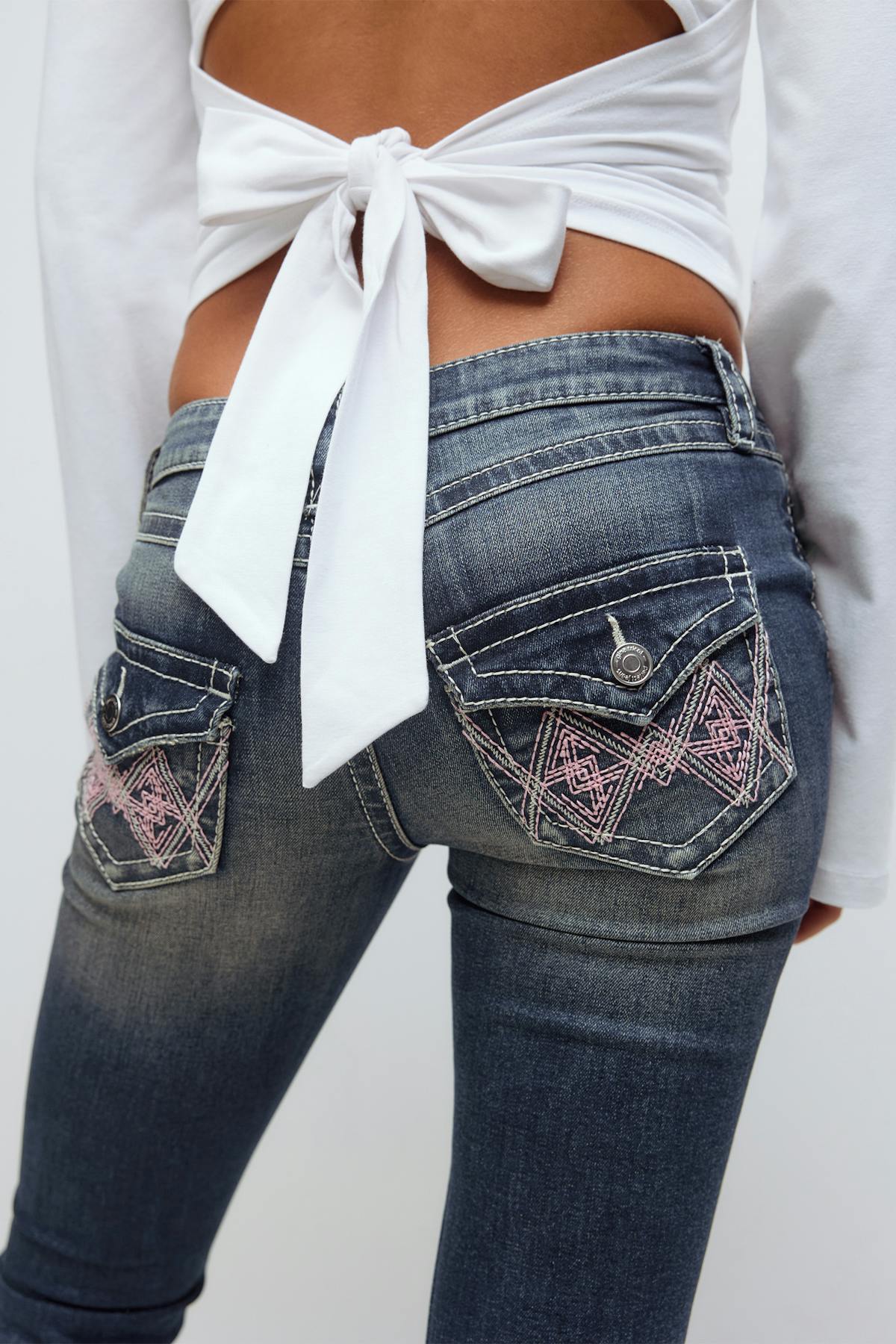 Iconic twisted jeans