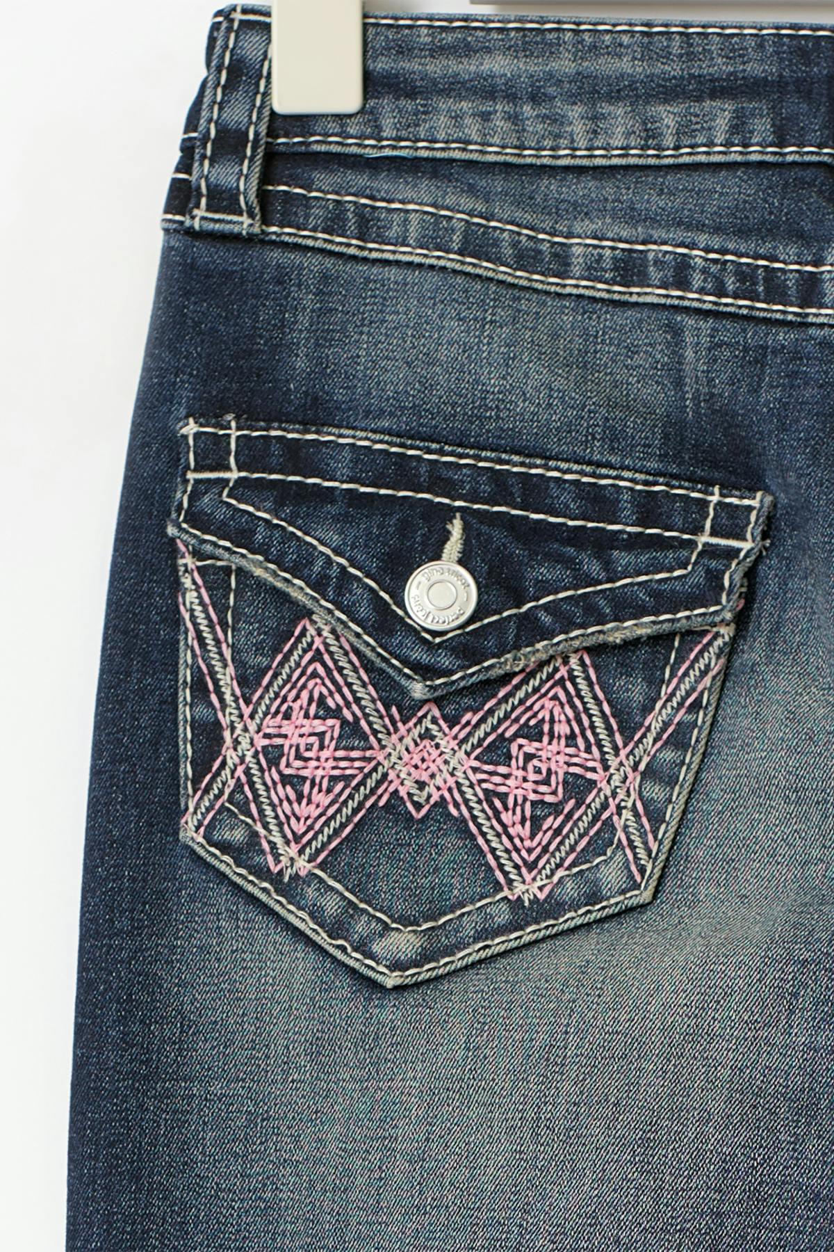 Iconic twisted jeans