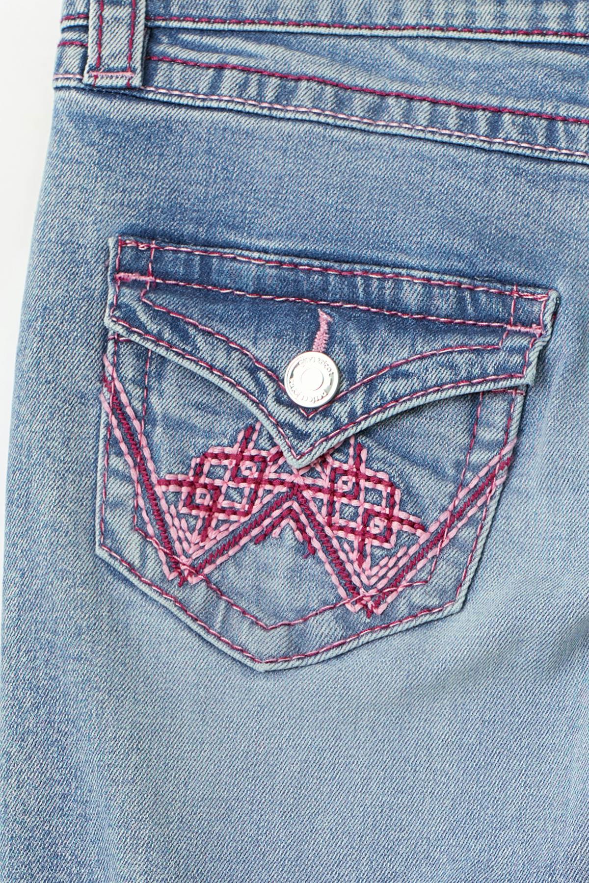 Iconic twisted jeans