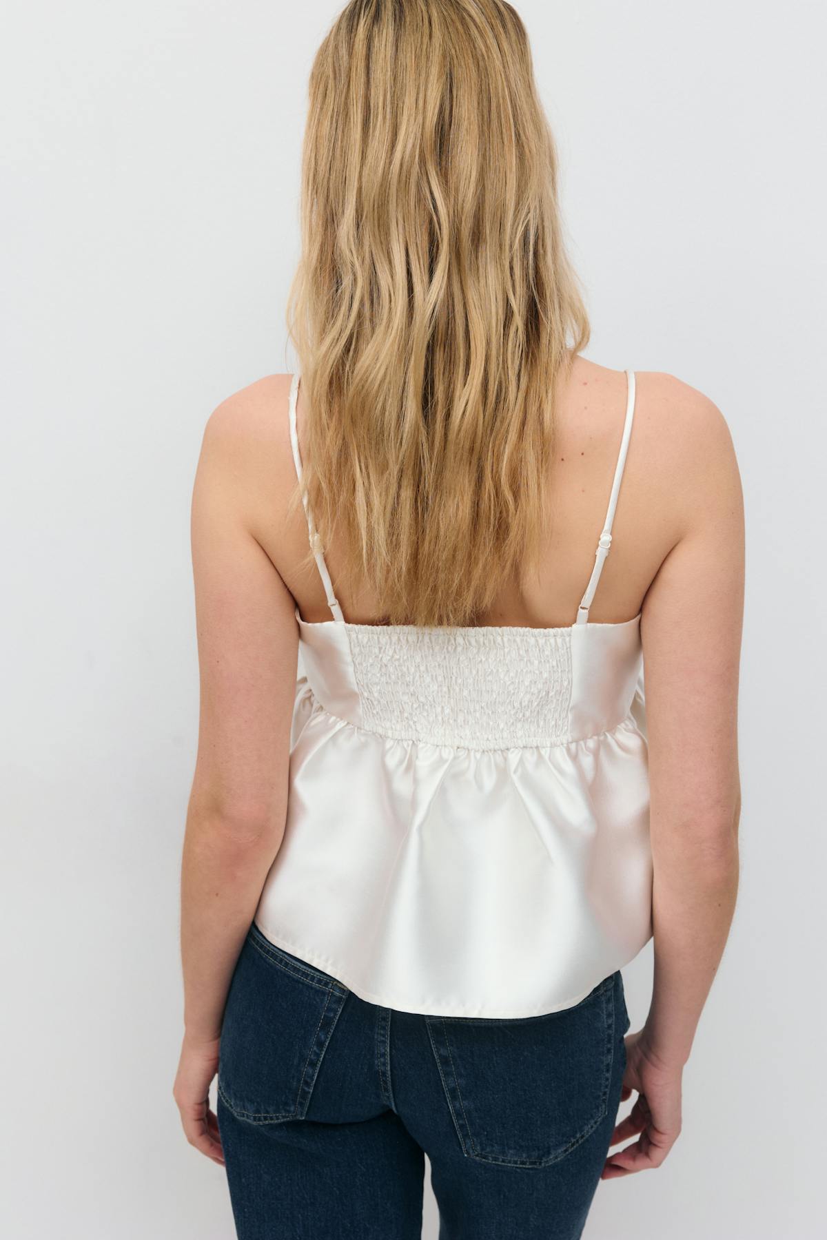 Shiny peplum top