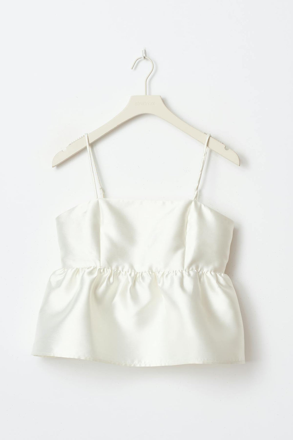Shiny peplum top