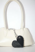 Remade bag charm