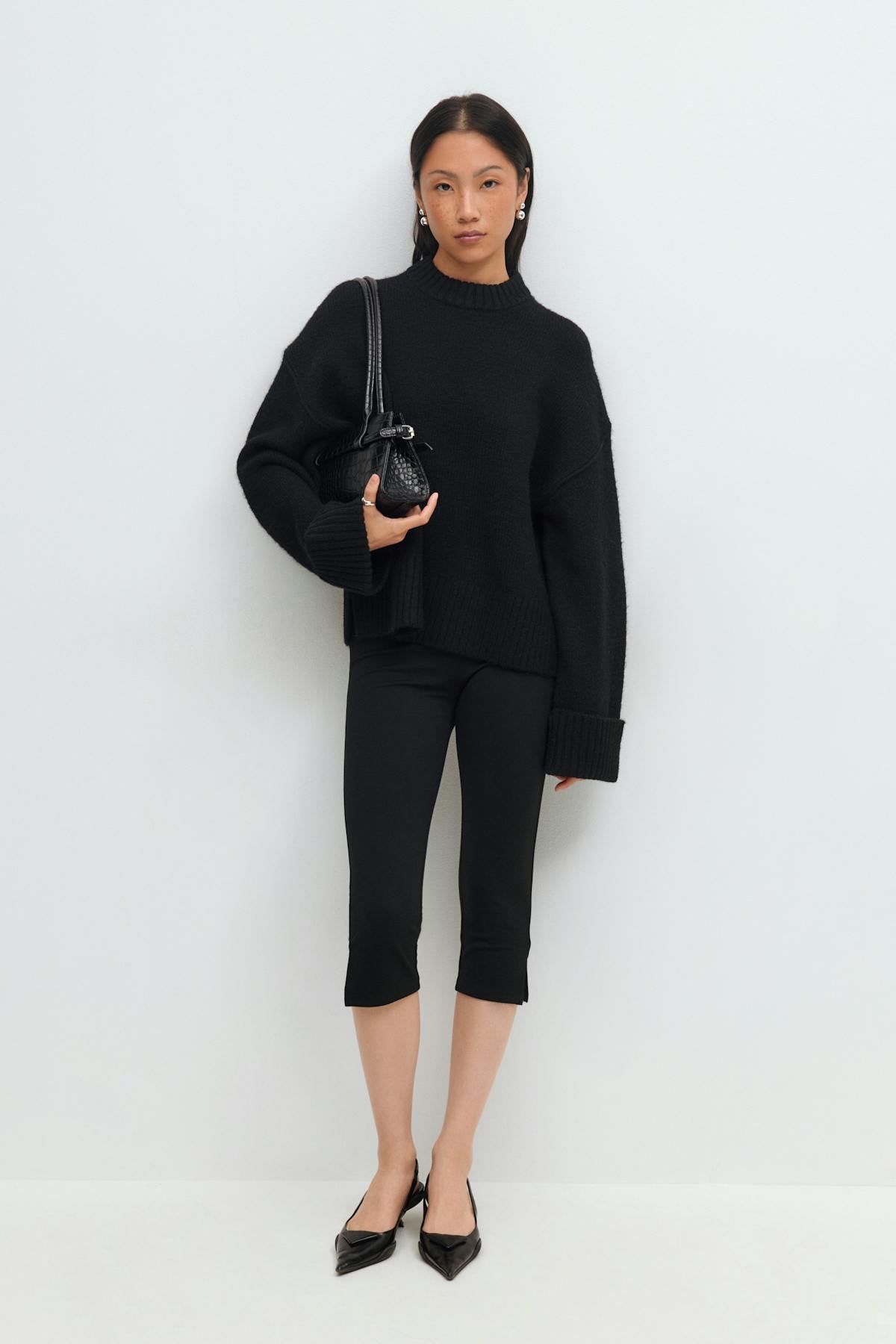 Folded sleeve knitted sweater