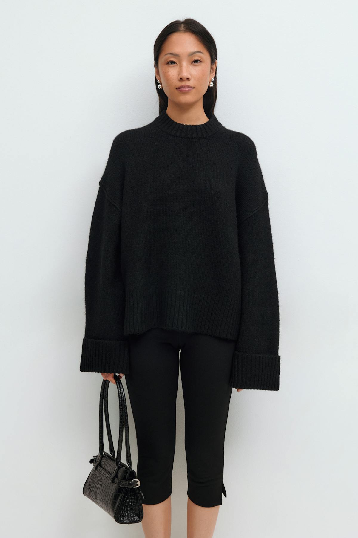 Folded sleeve knitted sweater