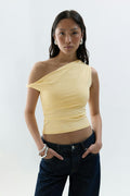 Asymmetric micro top