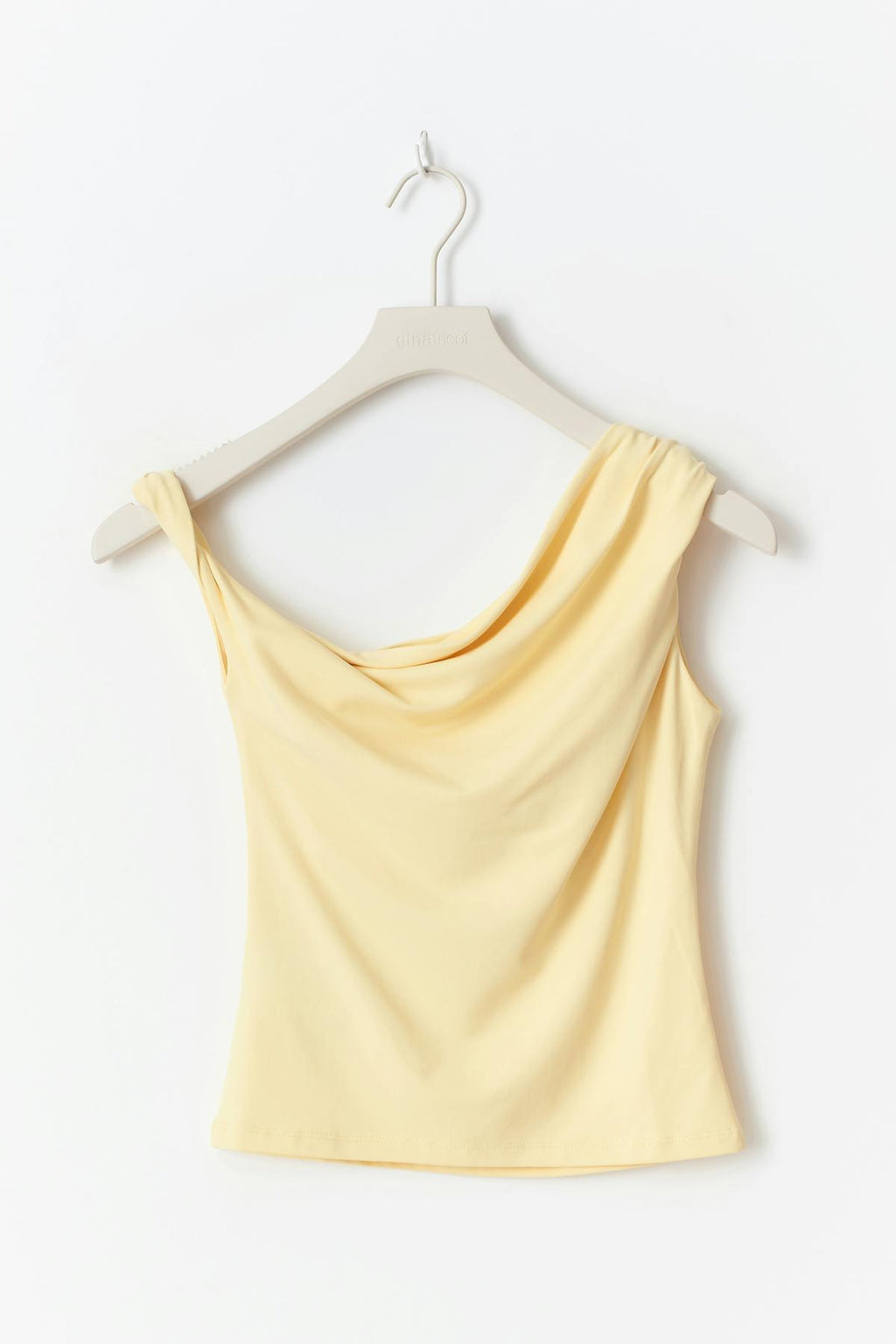Asymmetric micro top