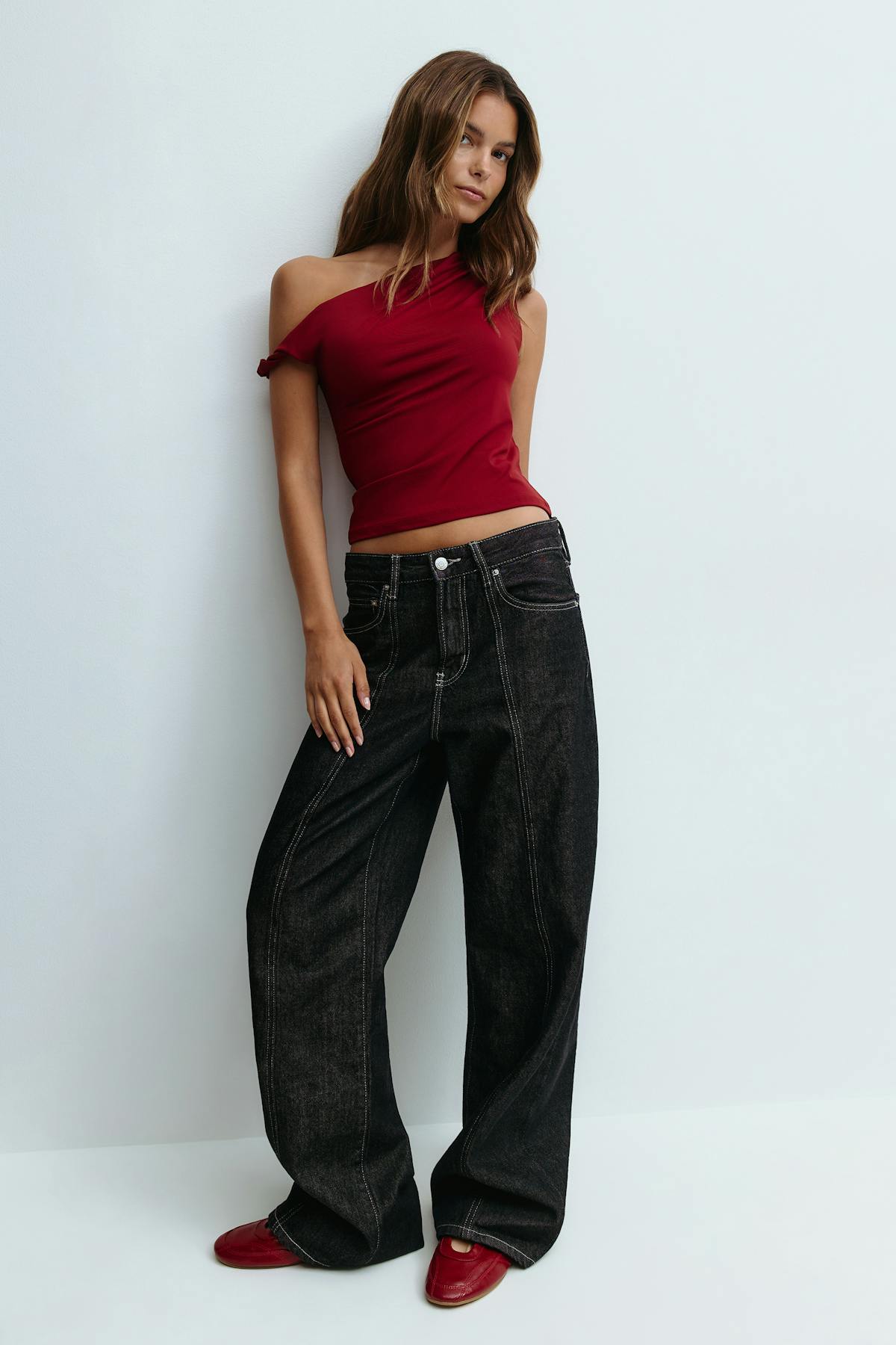 Asymmetric micro top
