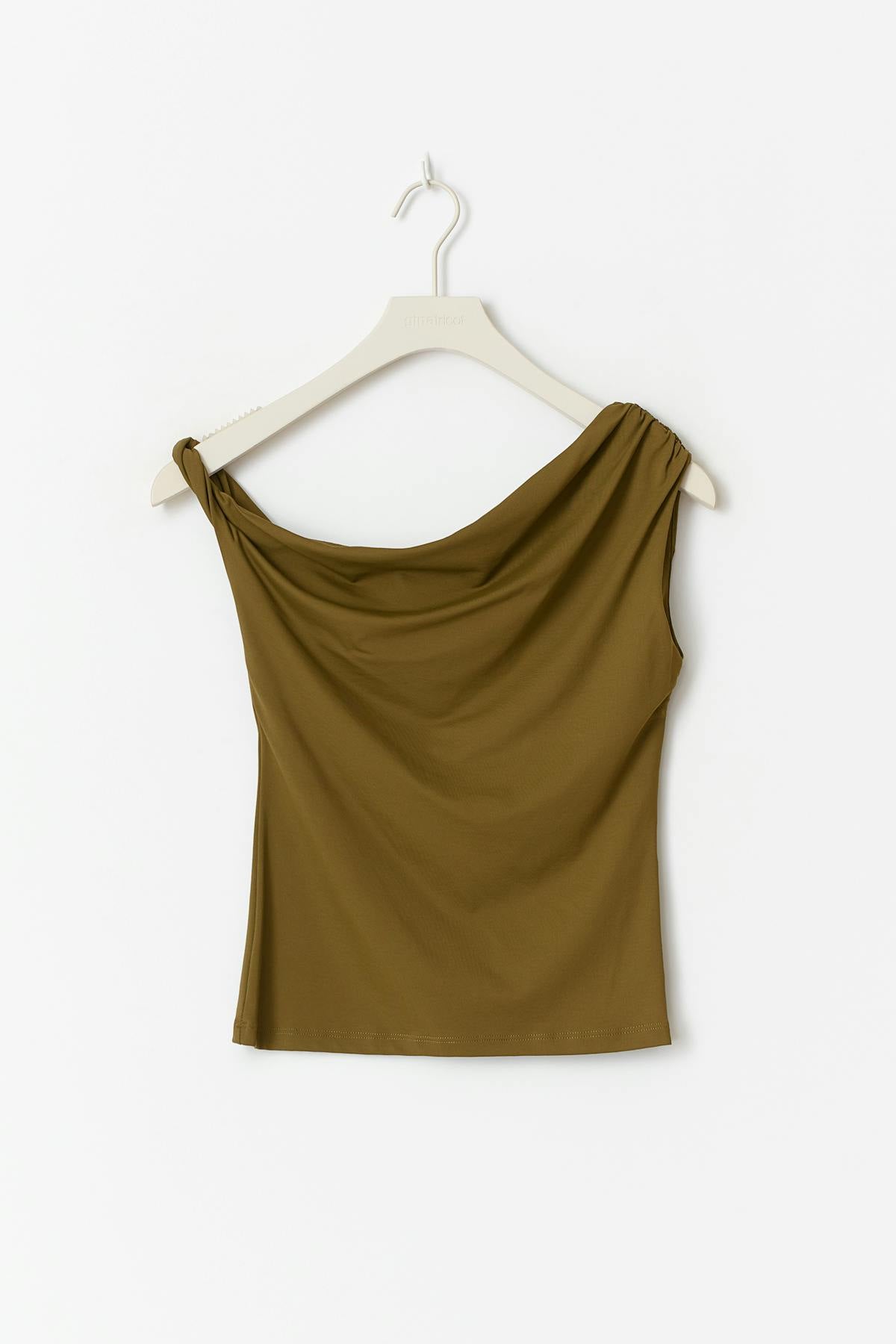Asymmetric micro top