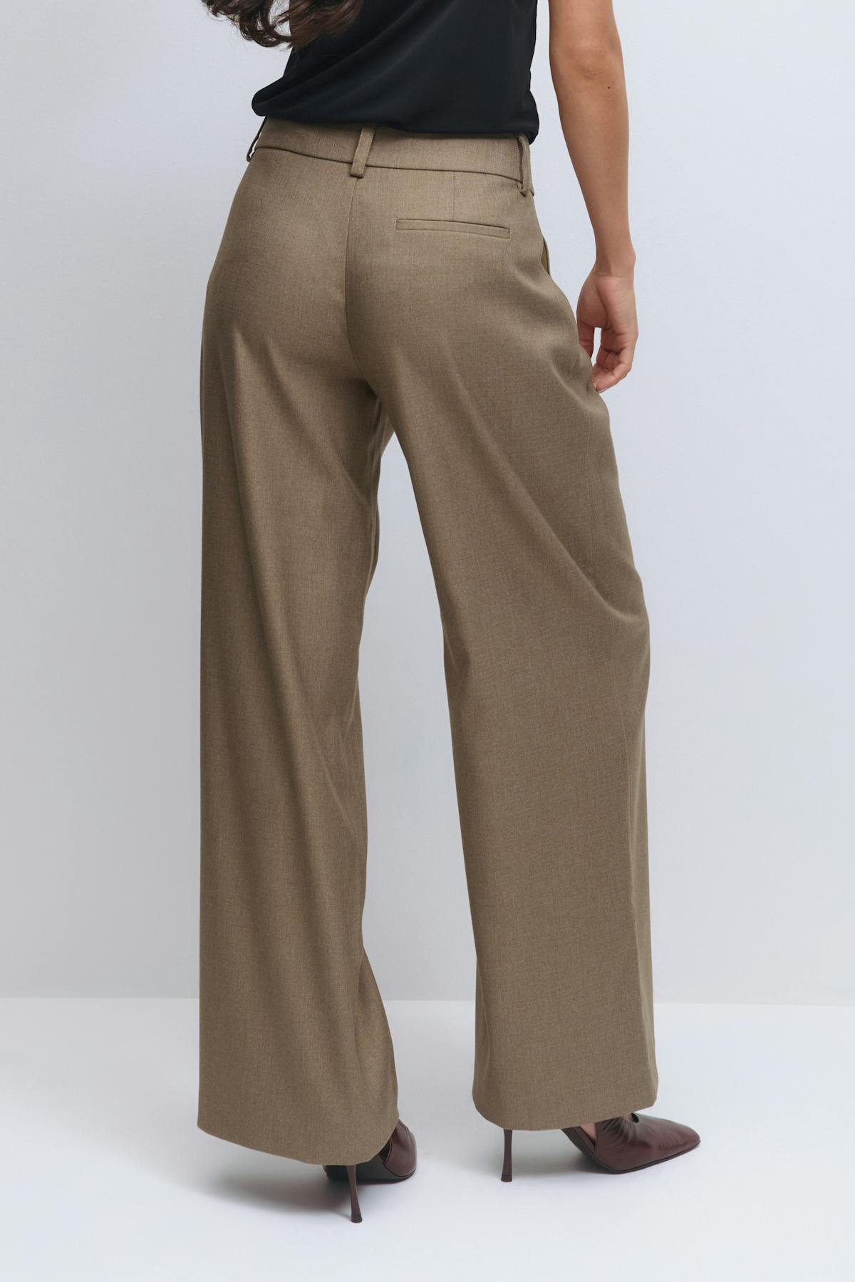 Low wide pleated trousers