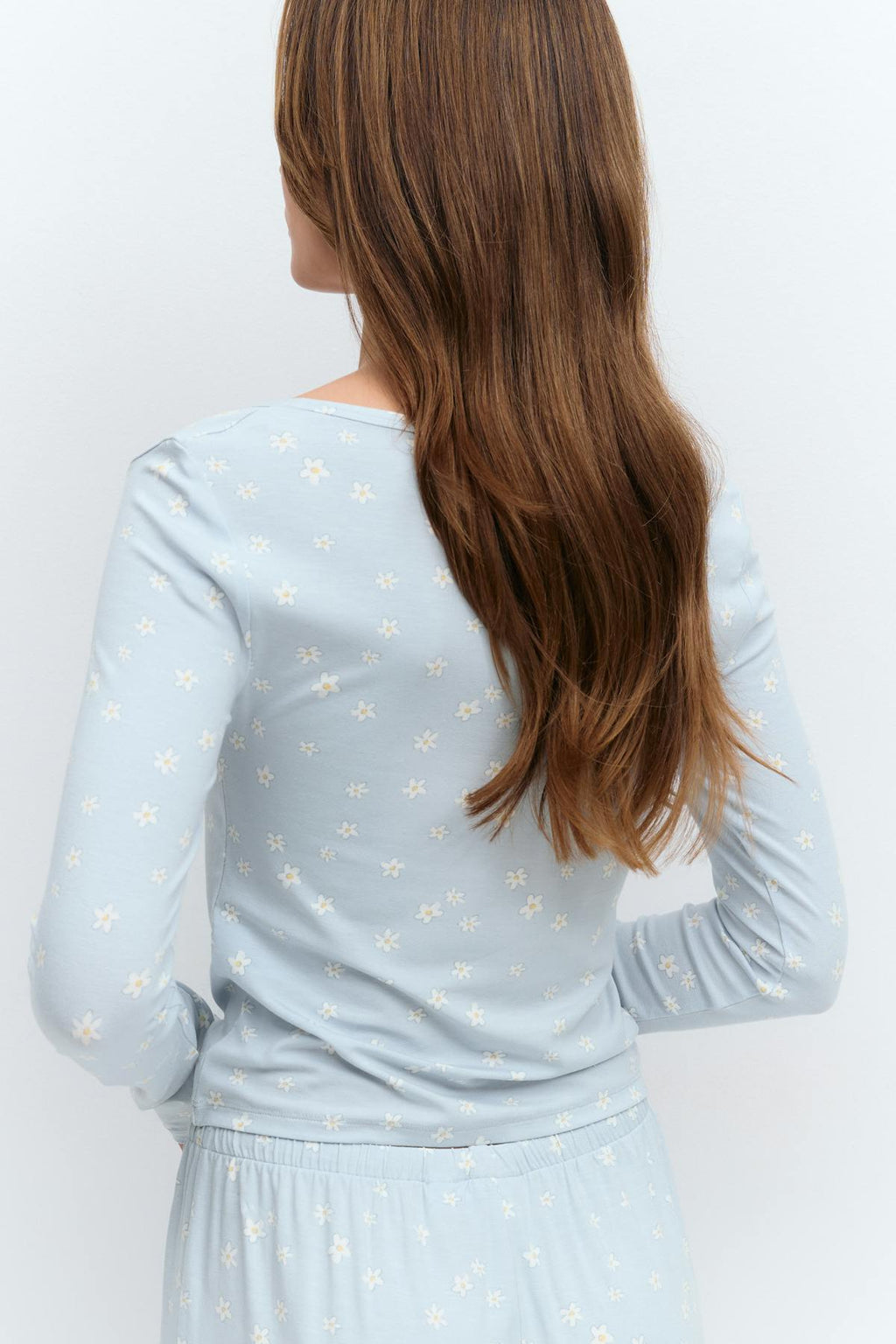 Buttoned up top