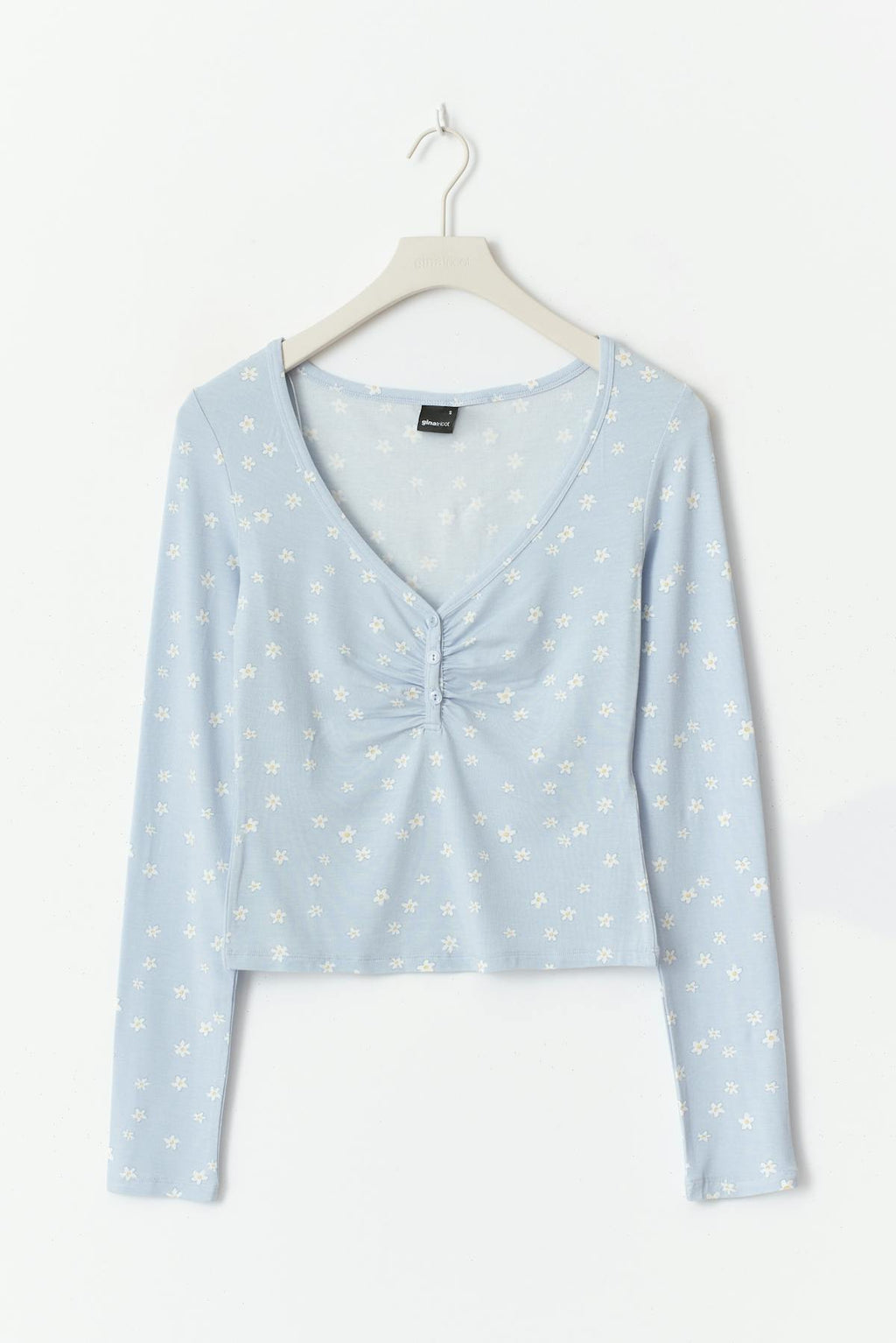 Buttoned up top