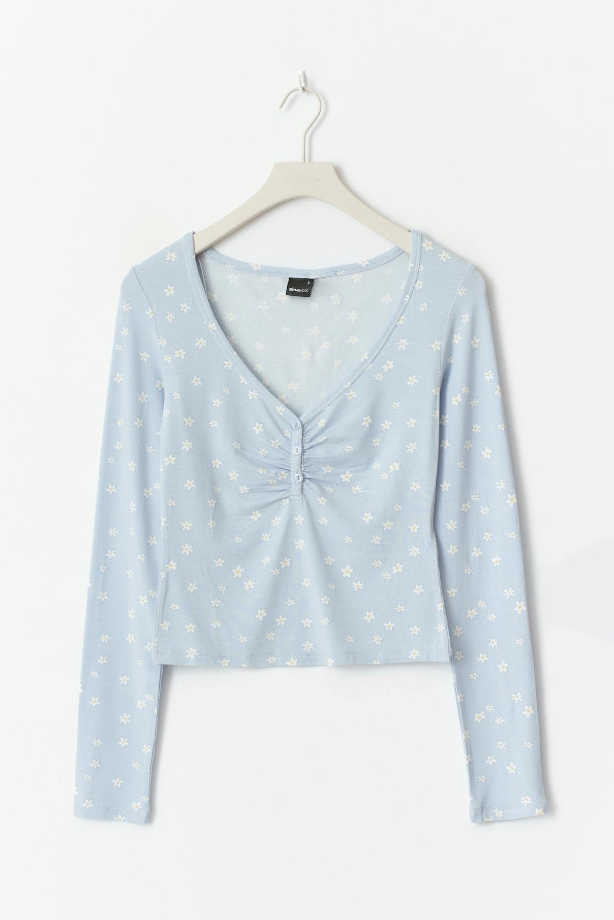 Buttoned up top