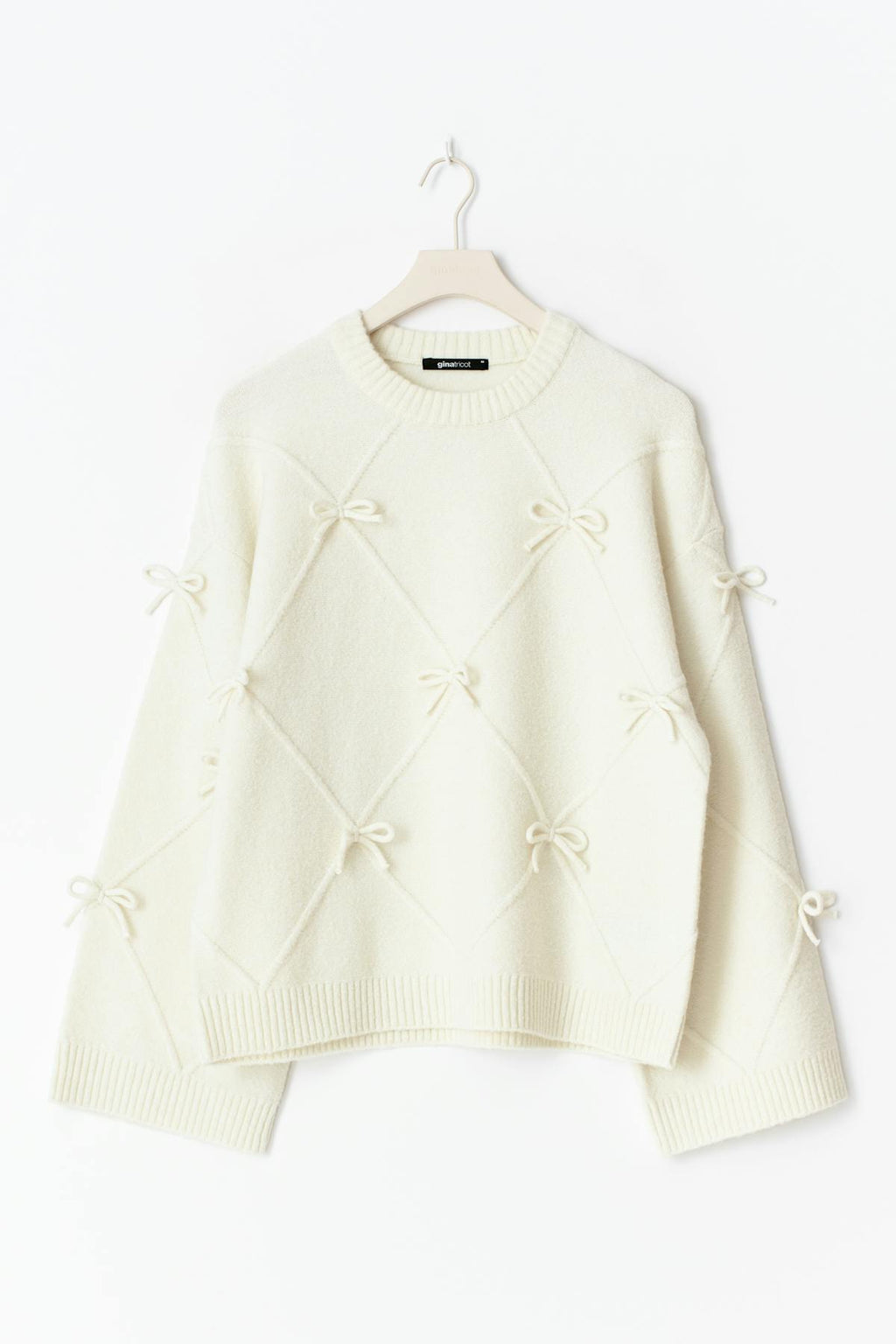 Knitted bow sweater