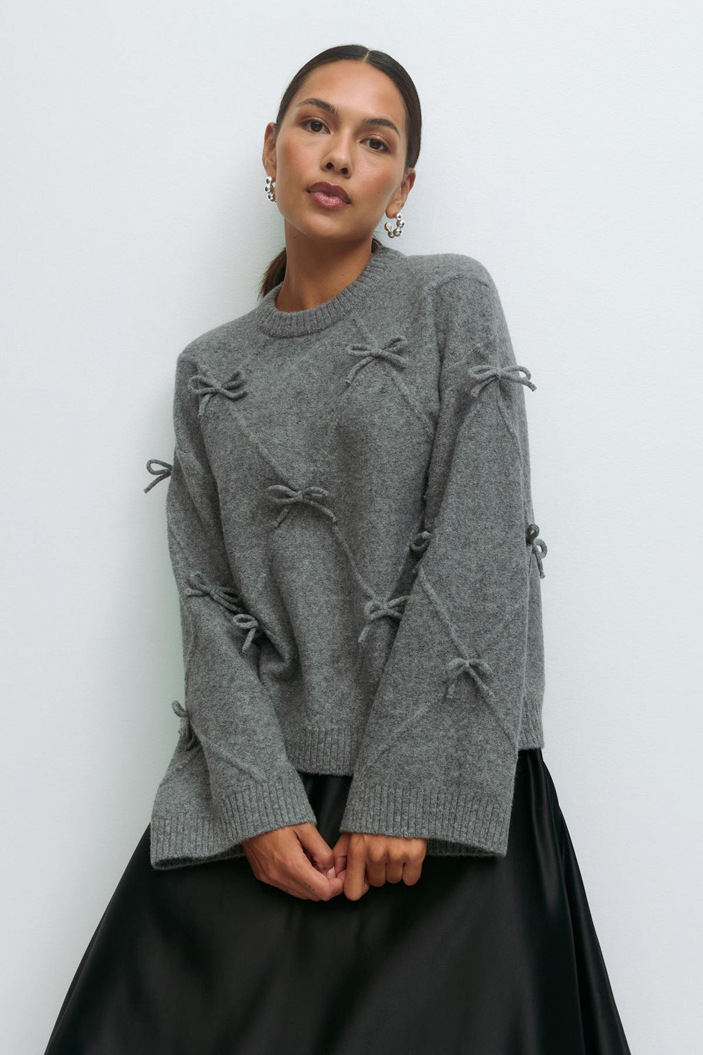 Knitted bow sweater