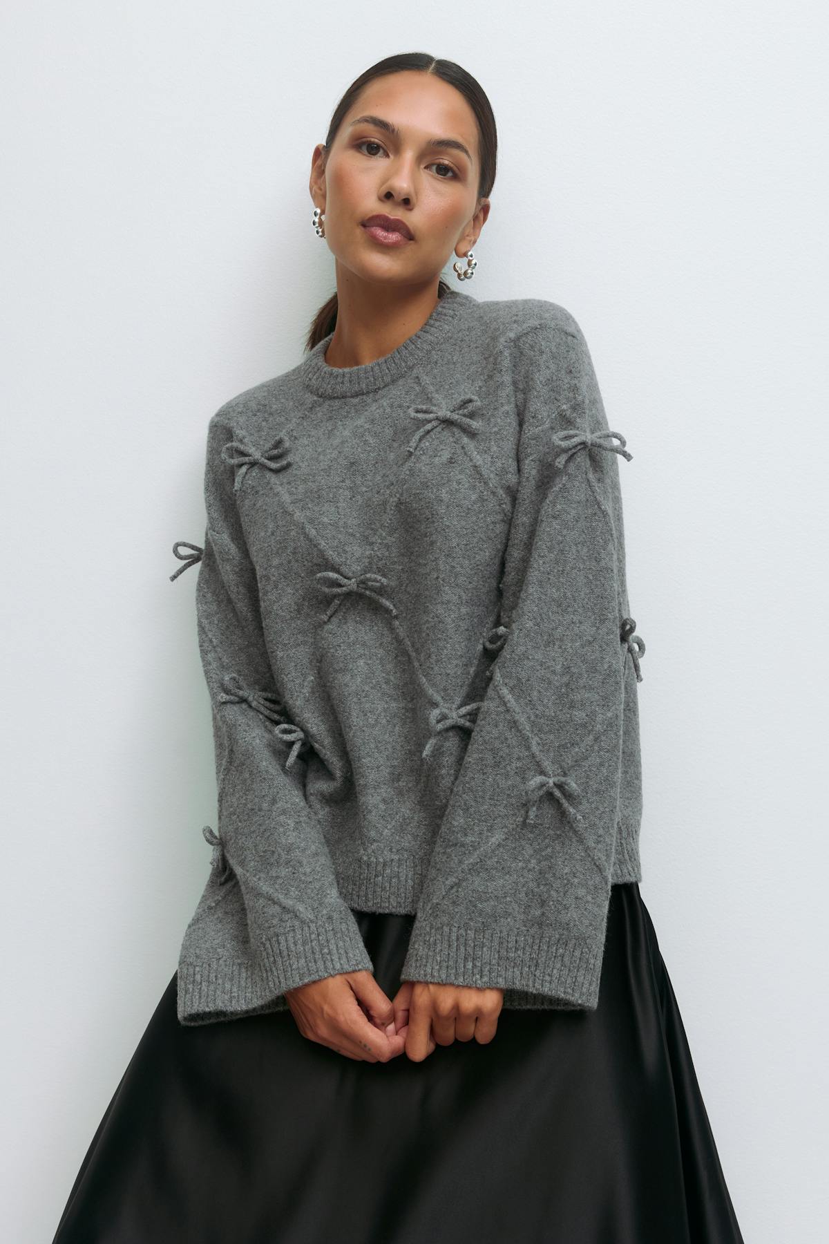 Knitted bow sweater