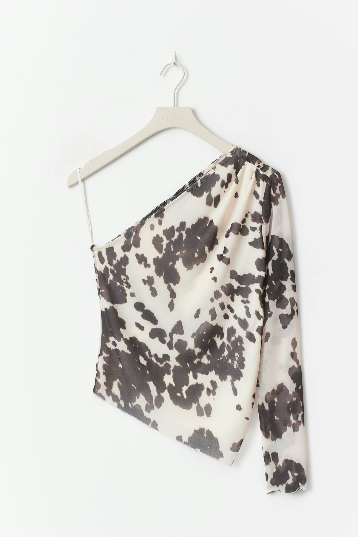 Asymmetric mesh top