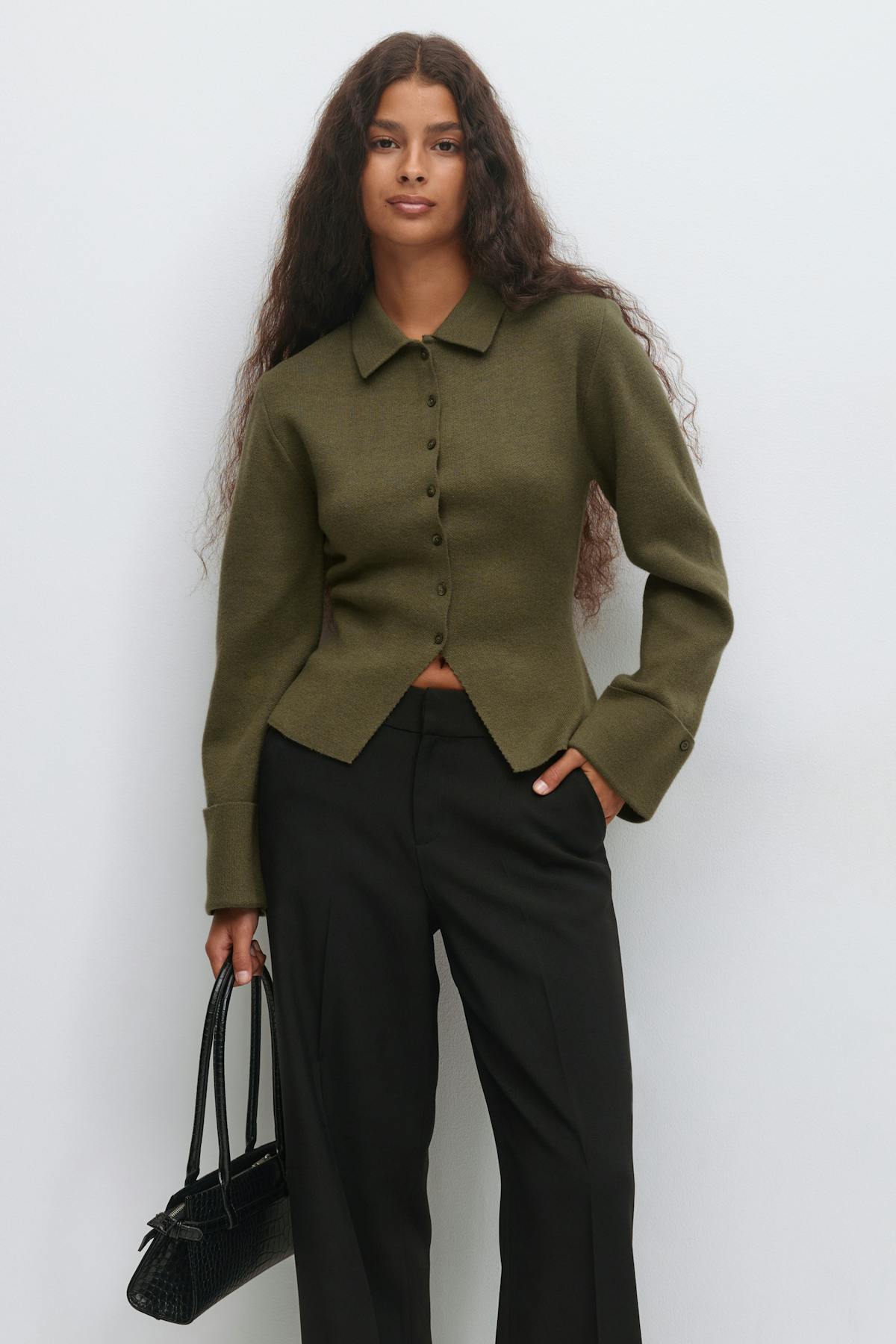 Shaped knitted cardigan