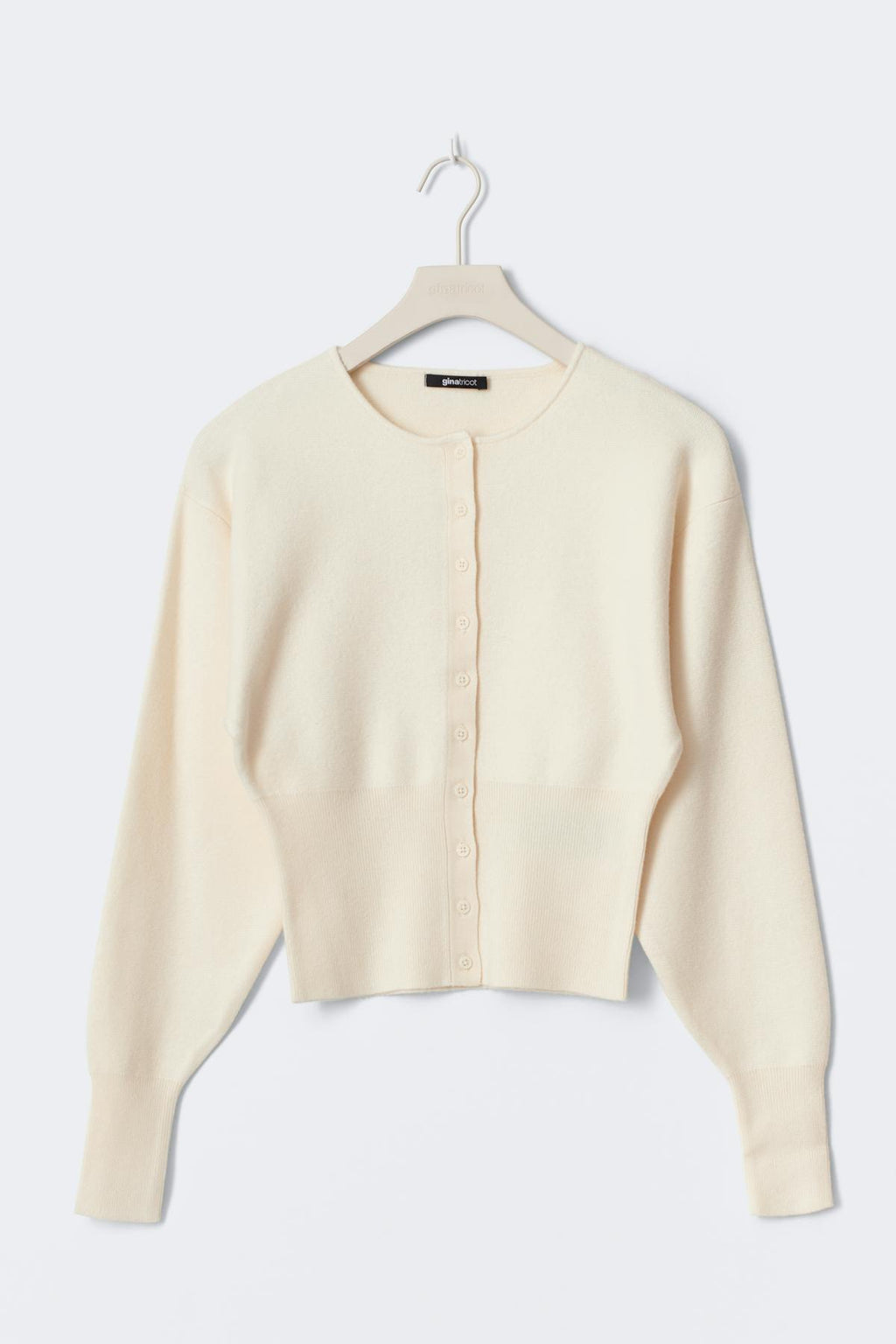 Shaped knitted cardigan