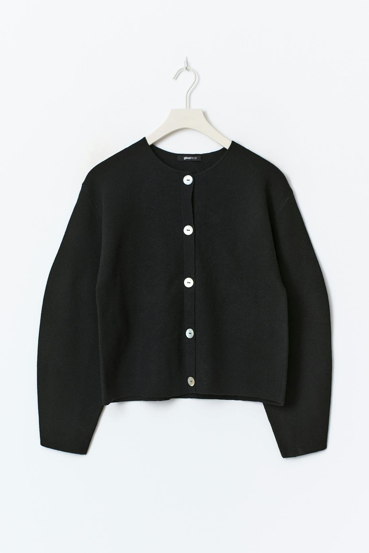 Shaped knitted cardigan