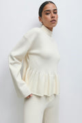 Knitted peplum top