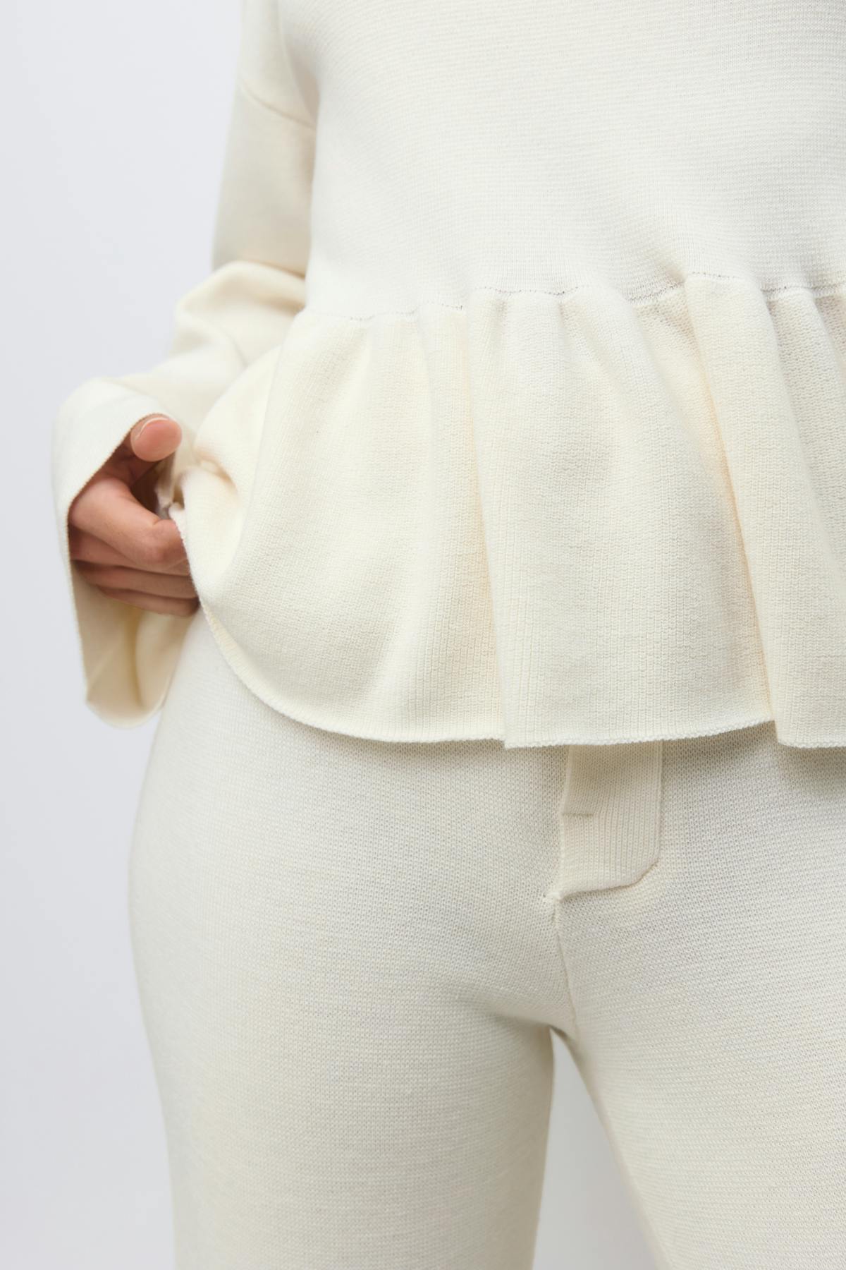 Knitted peplum top