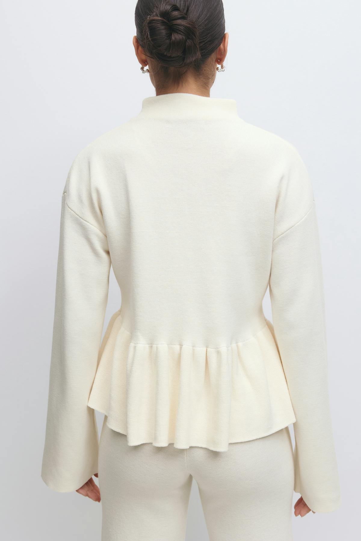 Knitted peplum top