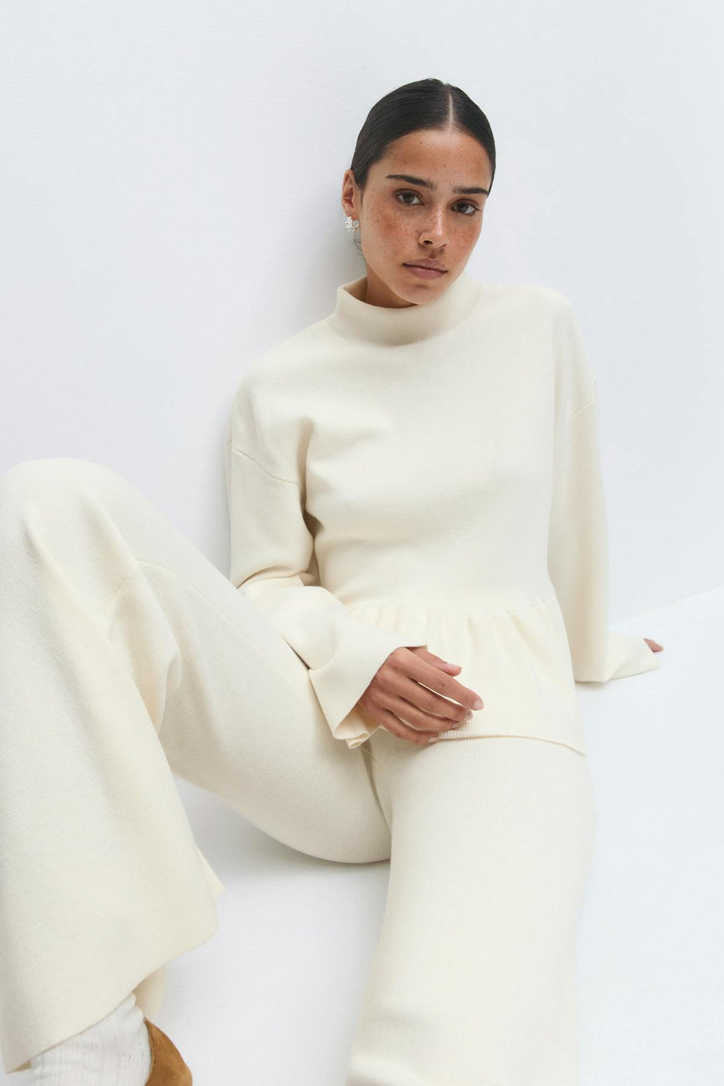 Knitted peplum top