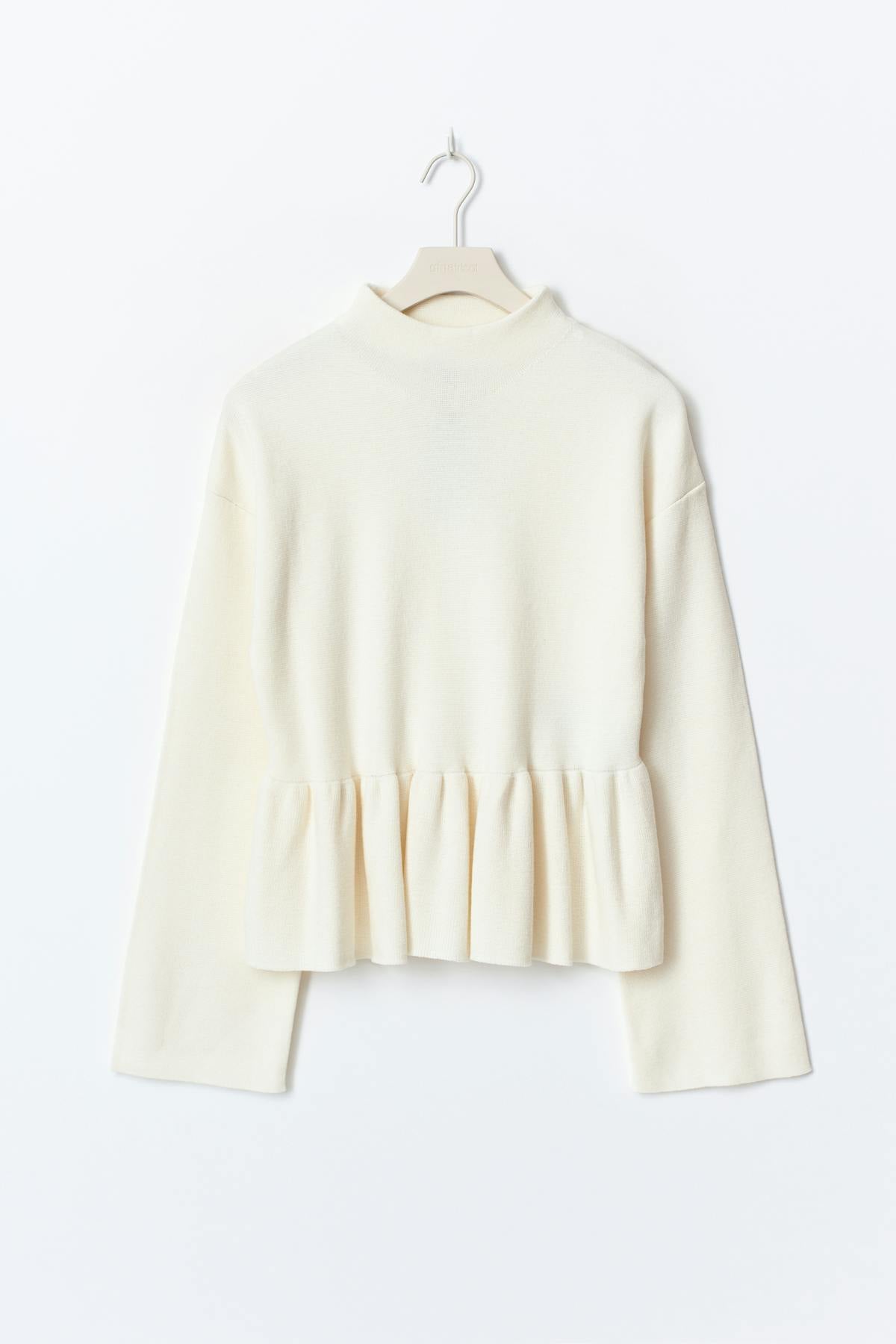 Knitted peplum top