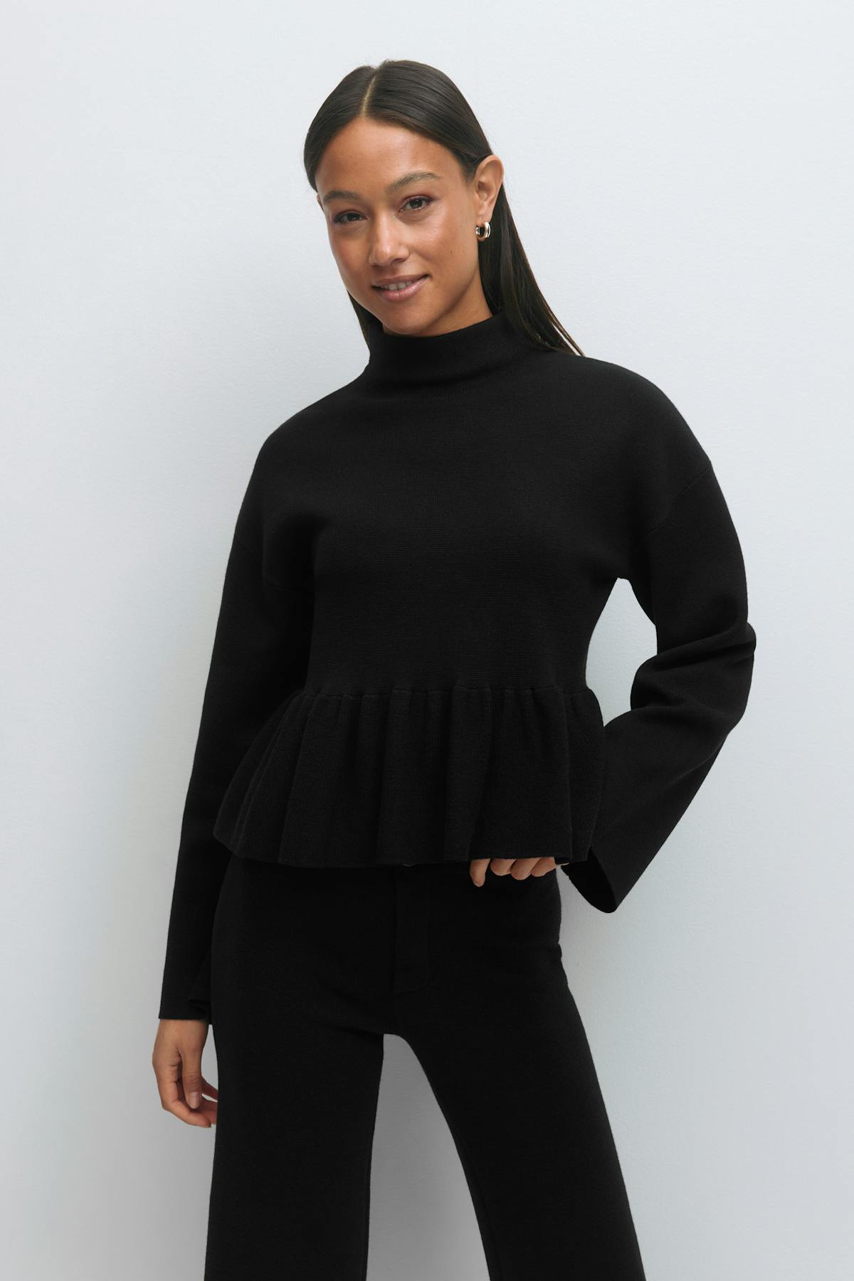 Knitted peplum top