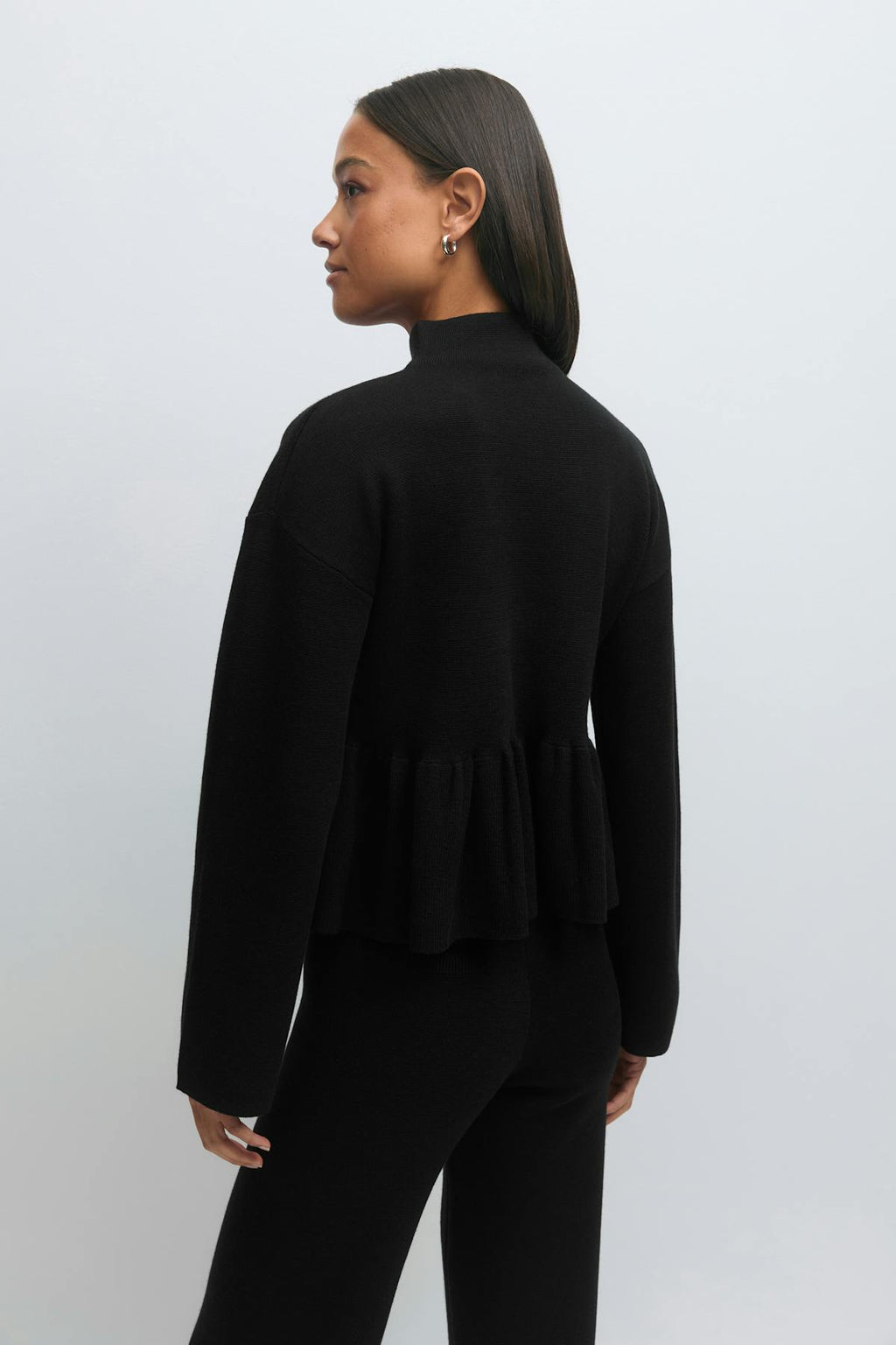 Knitted peplum top