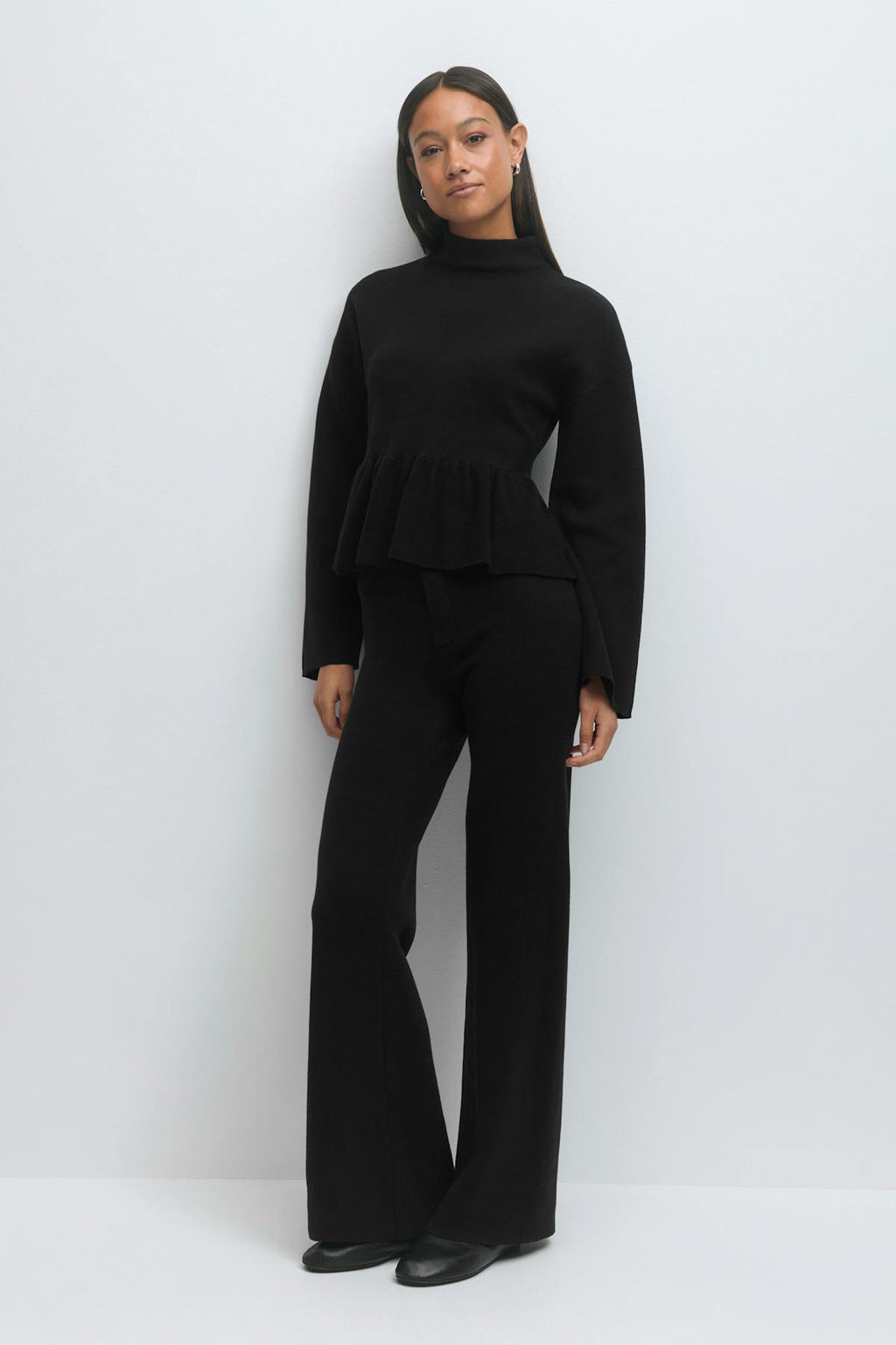 Knitted peplum top