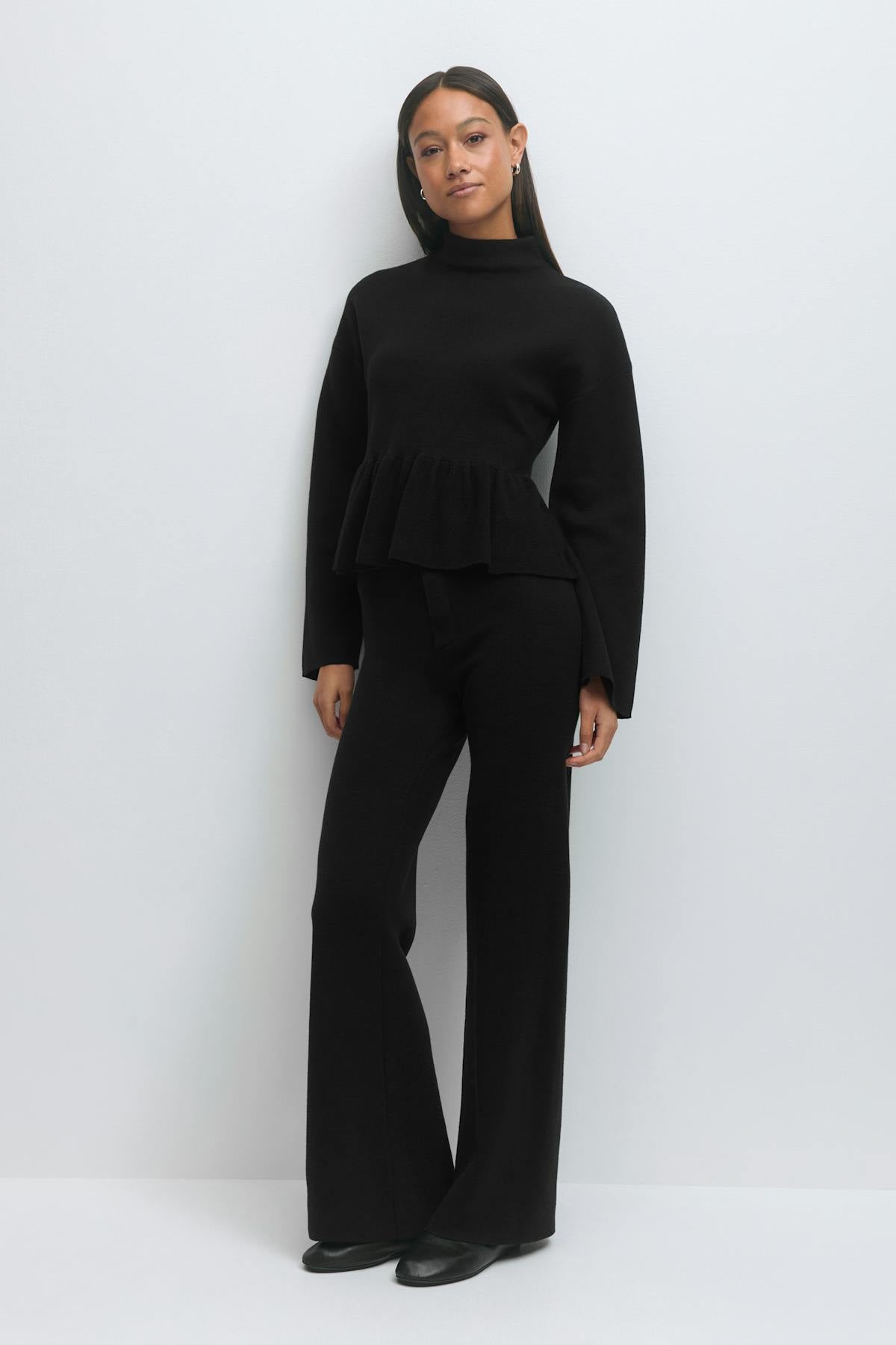 Knitted peplum top