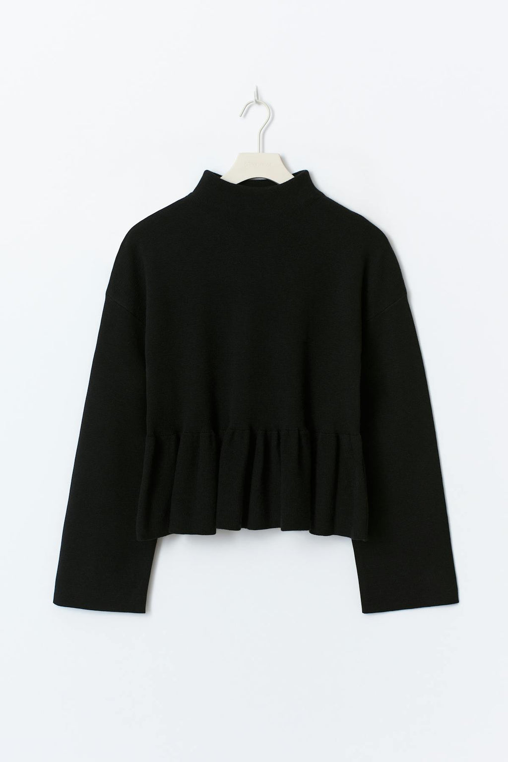 Knitted peplum top