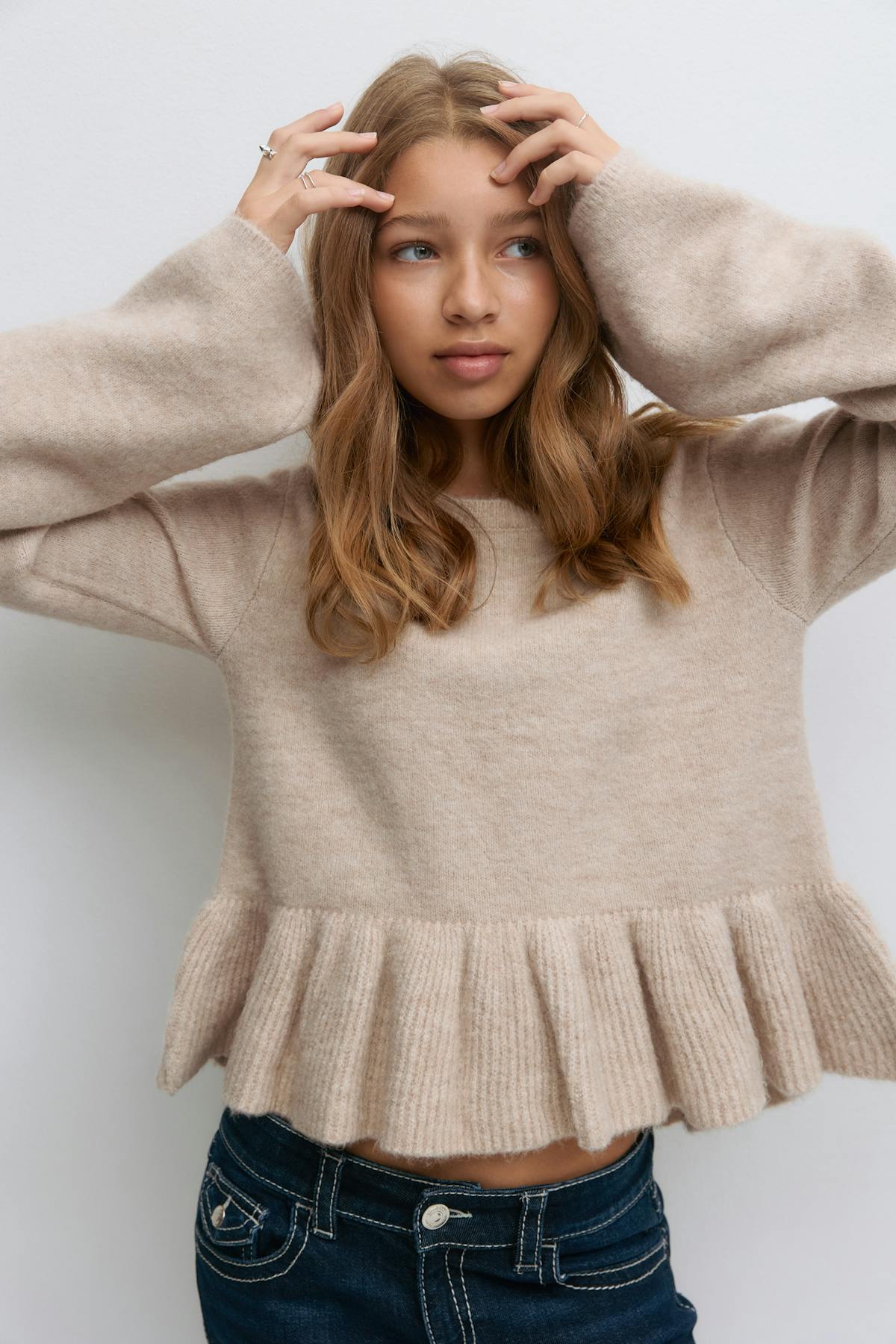 Y knitted peplum sweater