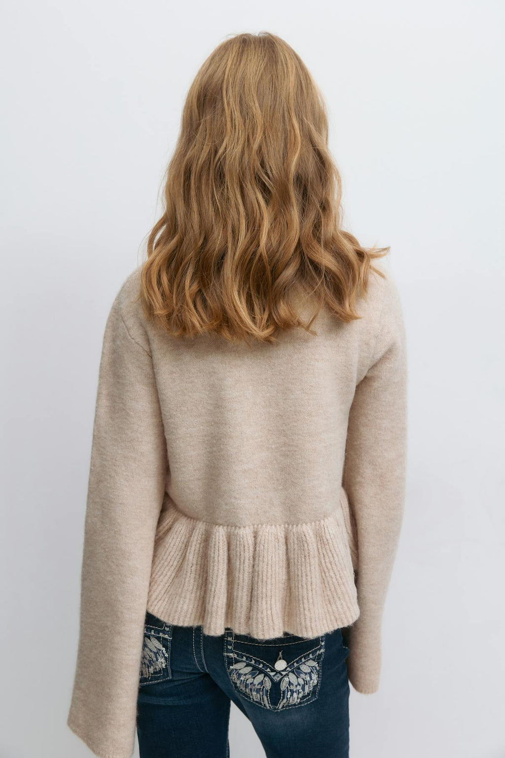 Y knitted peplum sweater