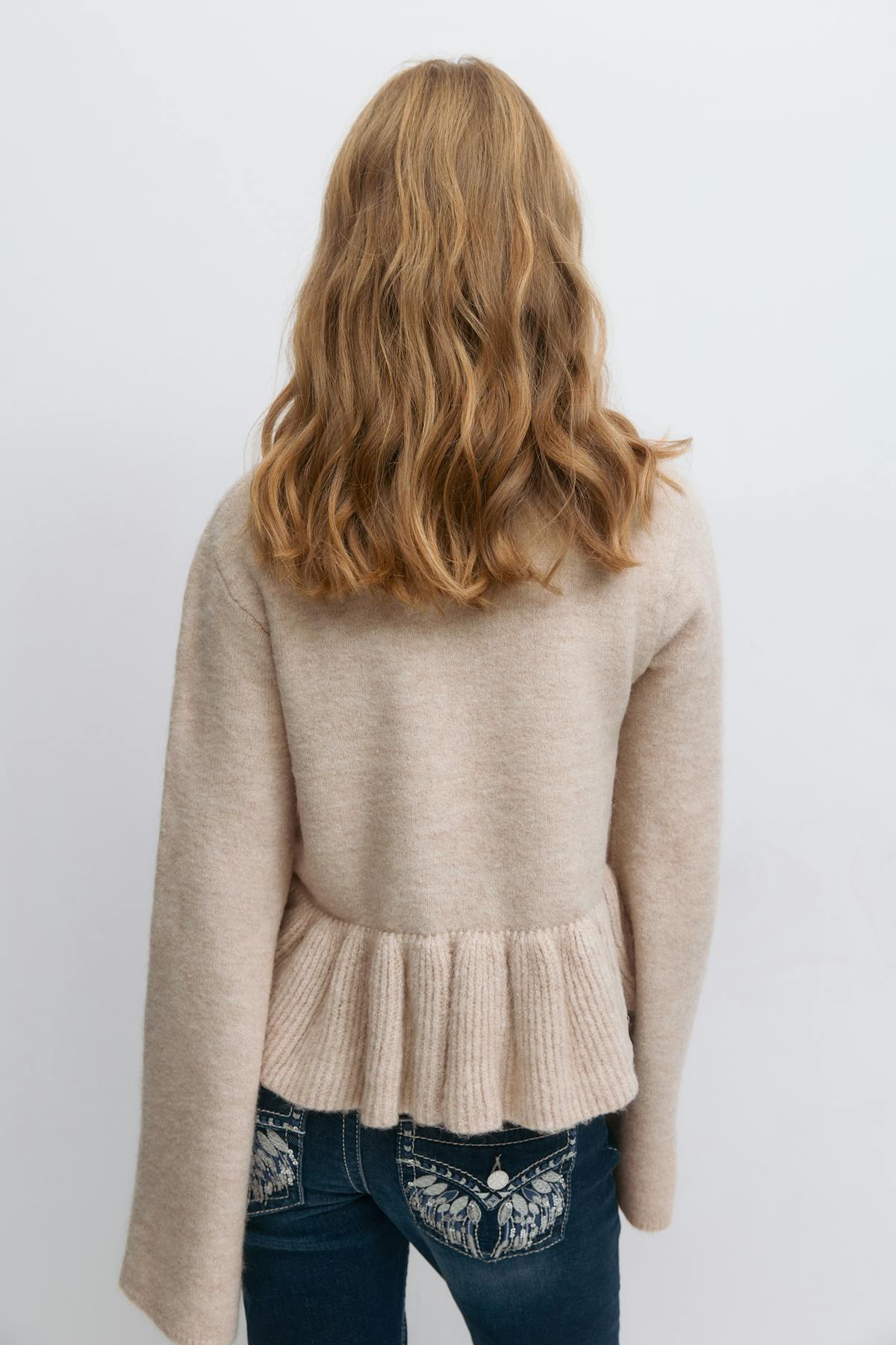 Y knitted peplum sweater