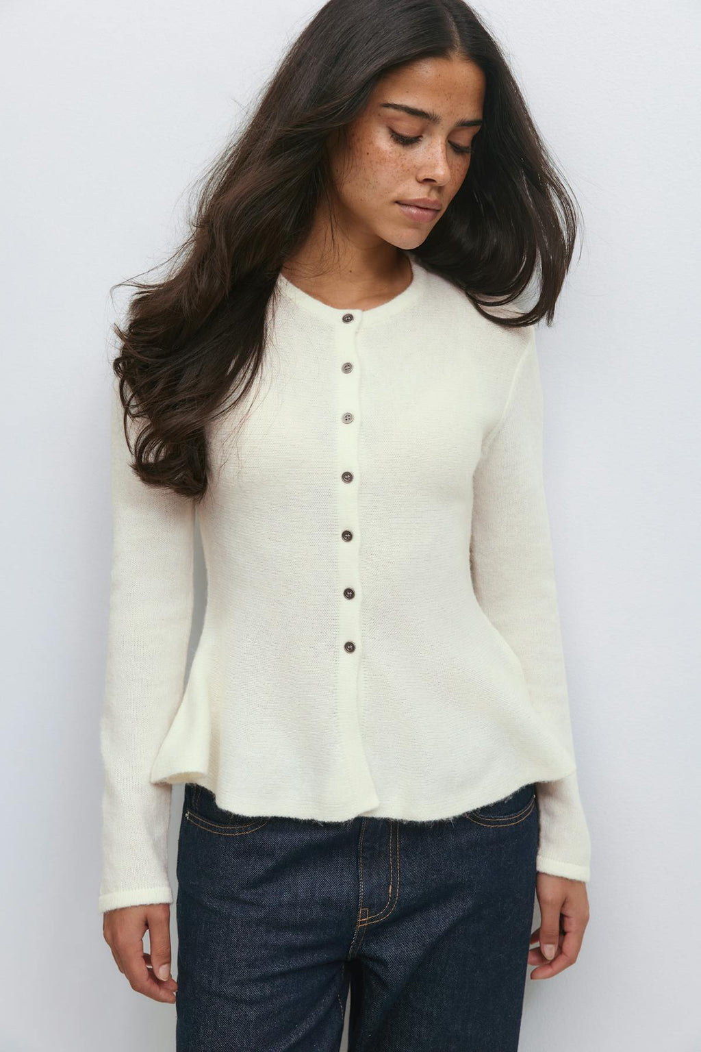 Knitted peplum cardigan