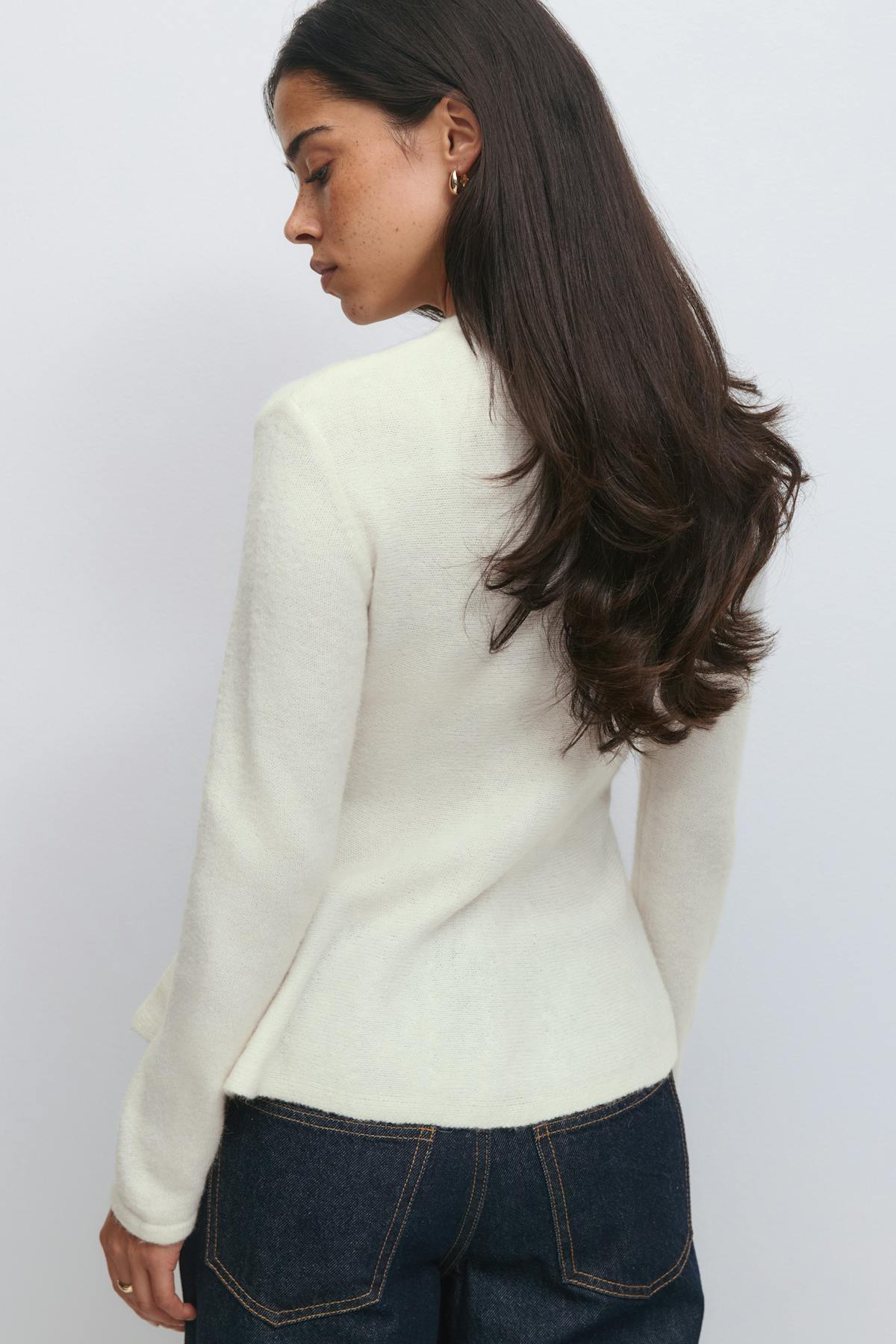 Knitted peplum cardigan