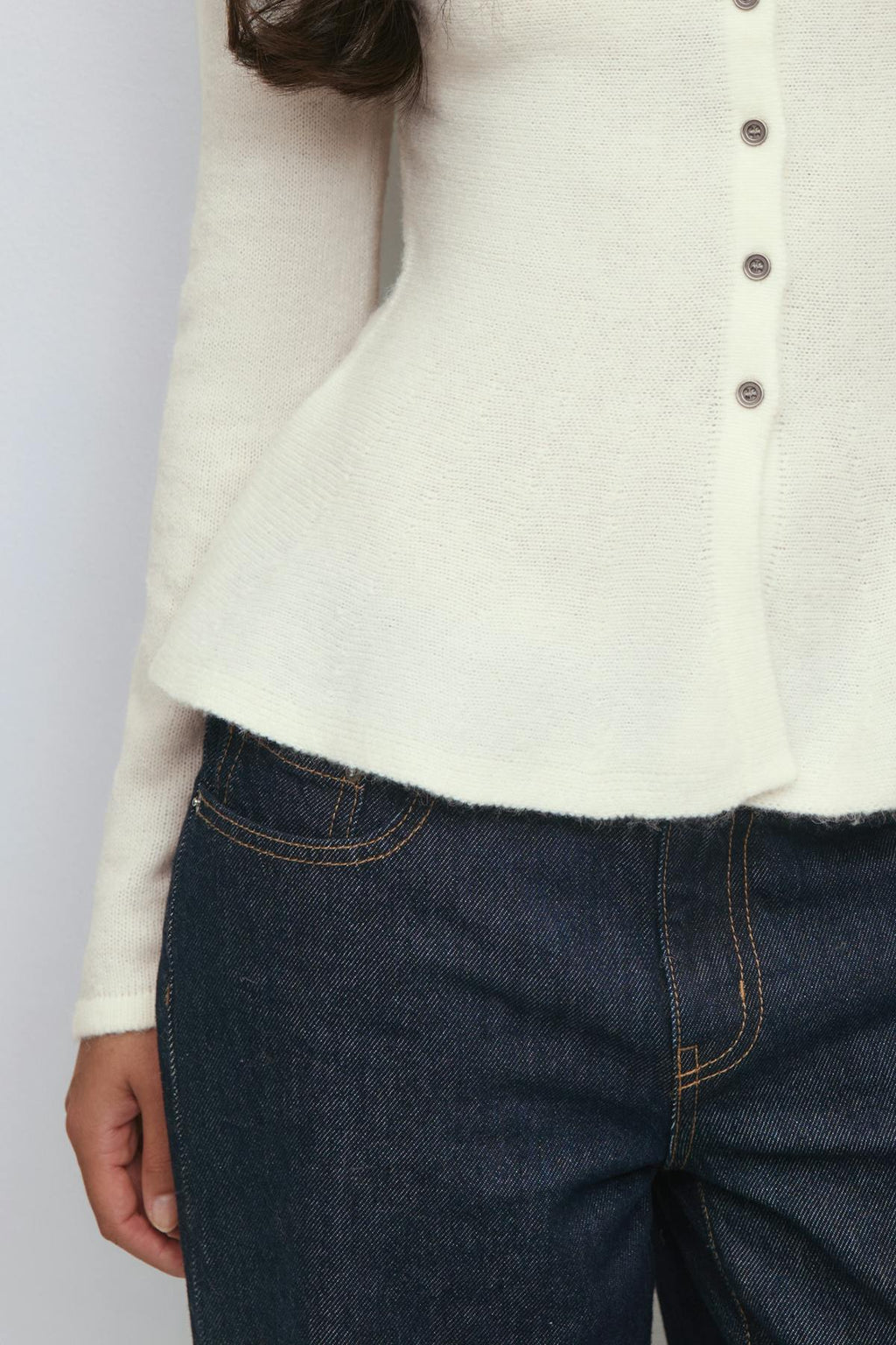 Knitted peplum cardigan