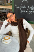 Knitted peplum cardigan