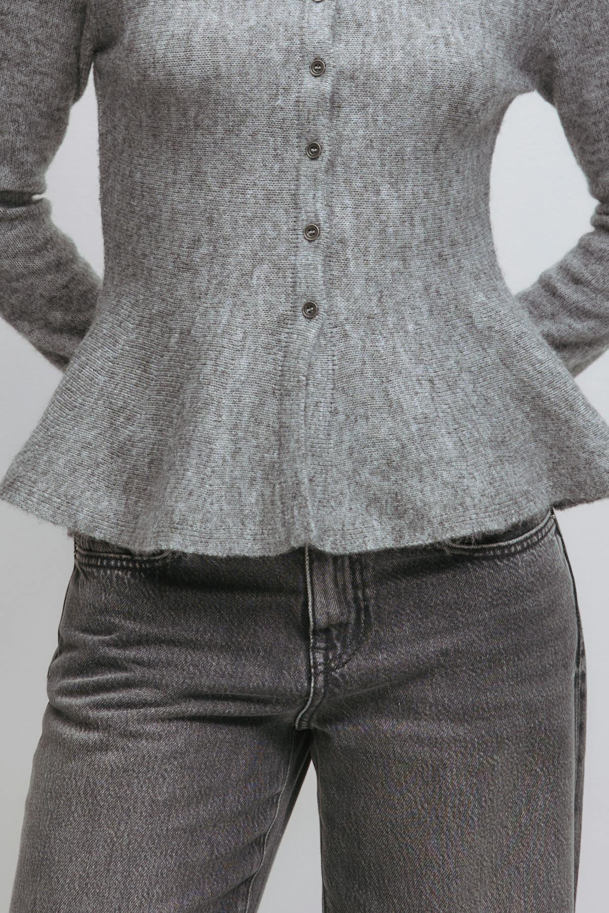 Knitted peplum cardigan