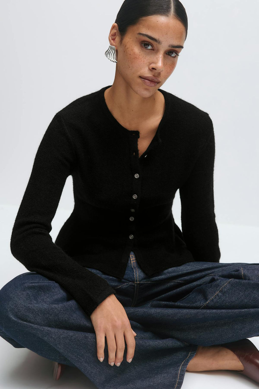 Knitted peplum cardigan