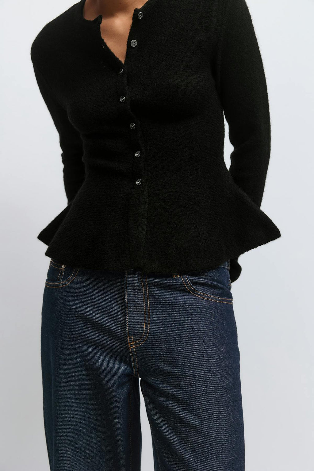 Knitted peplum cardigan
