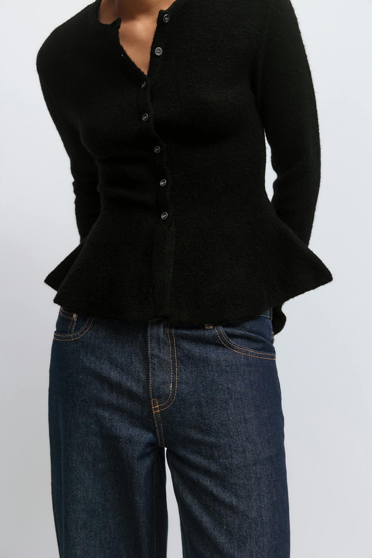 Knitted peplum cardigan